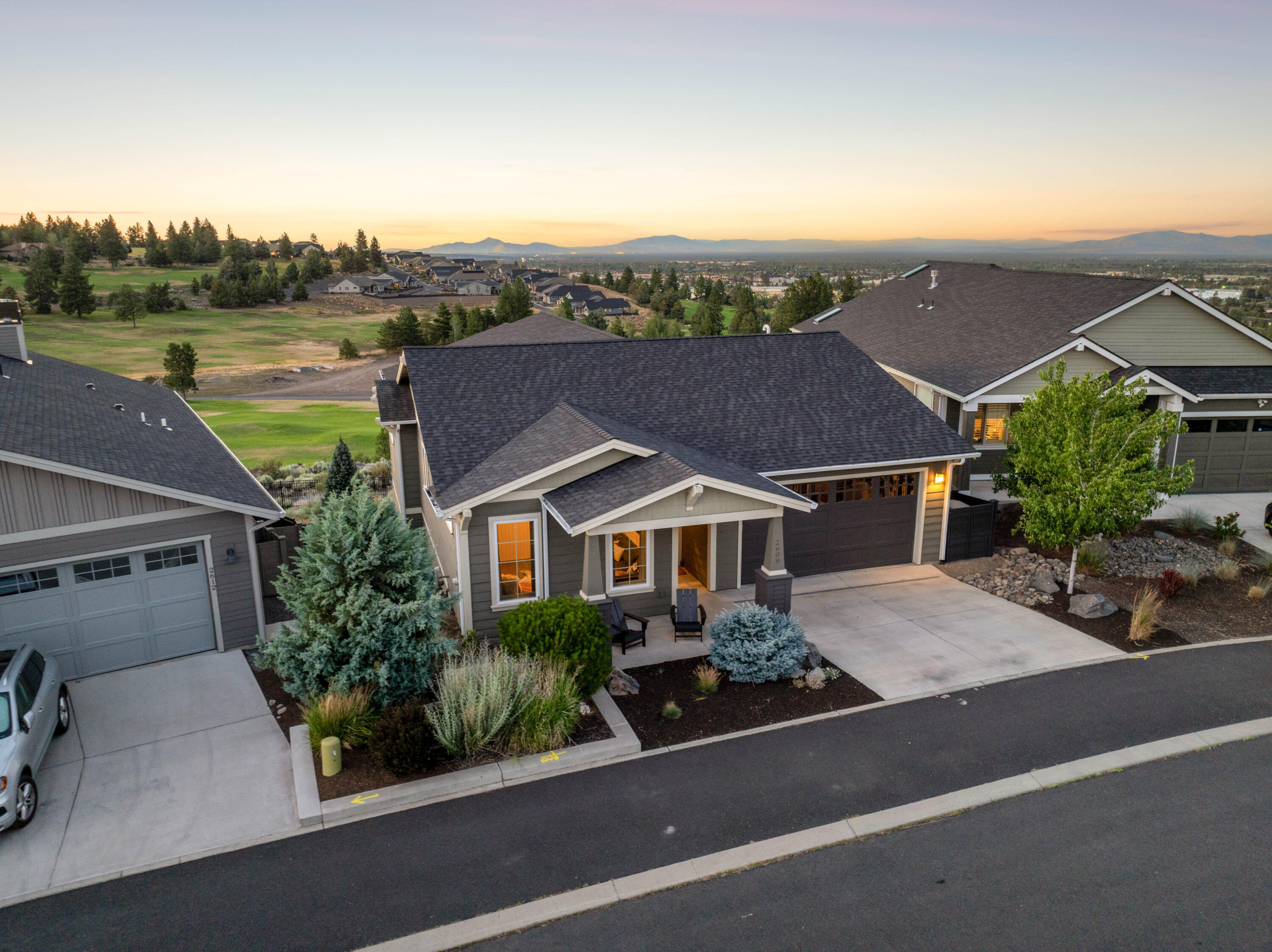 Stunning single-level Stone Bridge home on Awbrey Butte's coveted north side. This beautifully appointed 3-bedroom, 2-bath home showcases breathtaking north-facing views of Smith Rock and sweeping golf course vistas from Rivers Edge Golf Course. Sought after amenities include hardwood floors, premium finishes, California Closets in the primary suite, low-maintenance landscaping and even a garage sauna and gym. There is even the option to finish the 1500 sq ft lower level for additional living space. Just 1.2 miles to downtown Bend with quick access to hiking trails, Deschutes River, and the parkway. Minutes from NW Bend amenities, shopping, and dining, yet tucked away in one of Bend's most sought after neighborhoods. Luxury living with unparalleled views and active mountain lifestyle. Available furnished/turnkey or unfurnished. Perfect primary or second home.