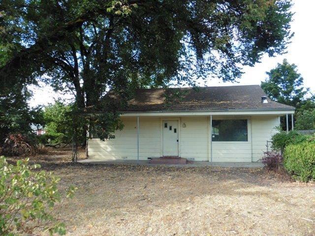 Lots of potential with this close-in country property. Nice, small acreage offers a 2 bedroom 1 bathroom home with a partially converted attic space with potential for more rooms as well as a detached shop. Come see the possibilities!