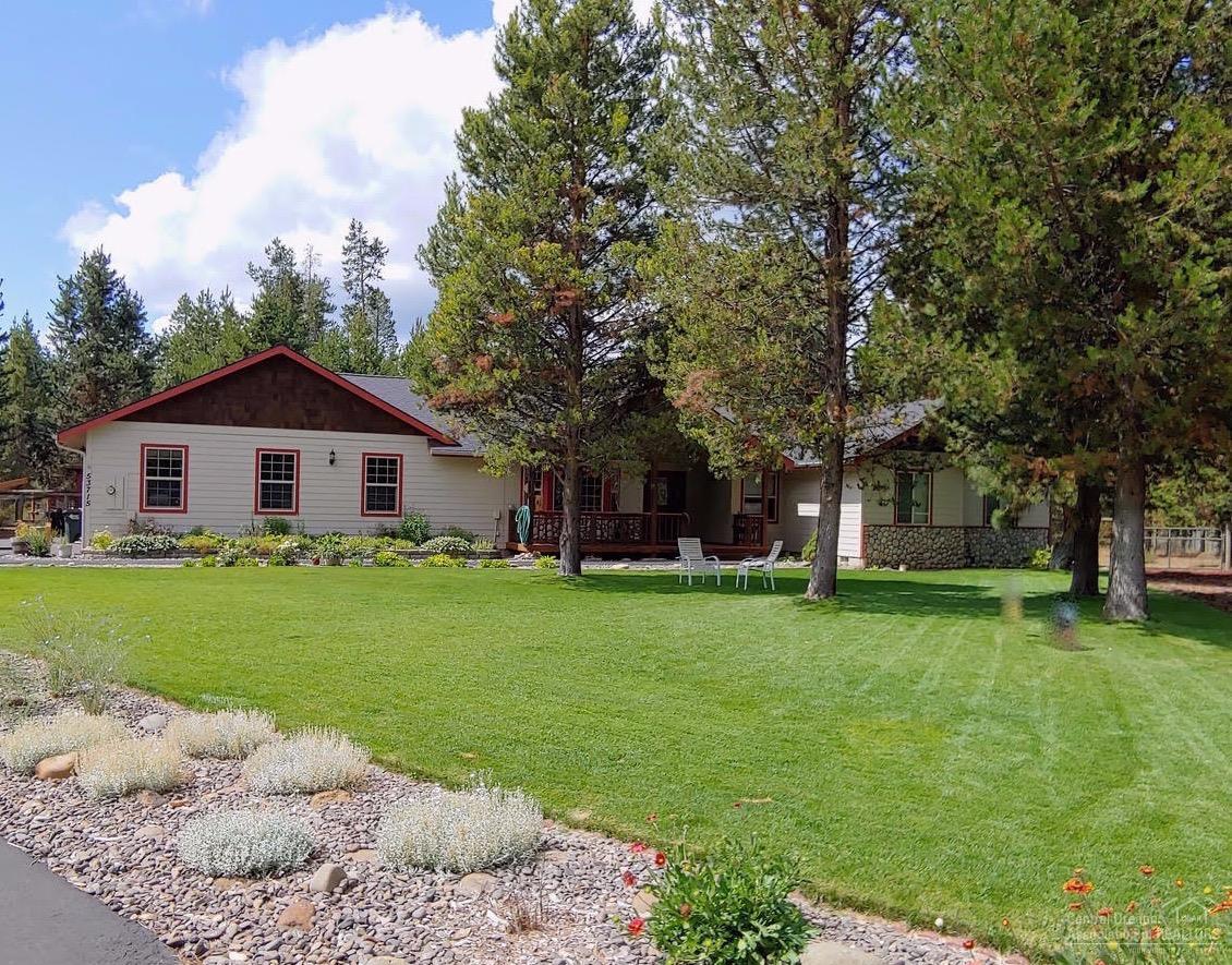 Custom built home by well known builder (Perry Walters Construction). This 2067 sq ft, 4 bed, 2.5 bath home sits on 1.36 fenced and cross fenced landscaped acres with automatic sprinkler system. The paved driveway leads to the 3 car garage and there is also a 28x36 shop with RV door and an additional carport/wing on one side. Shop has concrete floor and 100 amp panel box with a couple of plugs but will need your finishing touches. Located at the back end of a culdesac and very private. There is new carpet in the living area, master bedroom and the bedroom/office. The master features a walk in closet, bathroom with dual sinks, soaking tub and seperate shower. The kitchen is open to the living area and features granite tile countertops and an island. The Hearthstone soapstone fireplace insert is great for taking the chill off and the heat pump provides both heat and AC. 1.01 acre lot next door is also available at a discounted price. Owner is Licensed broker in the State of OR