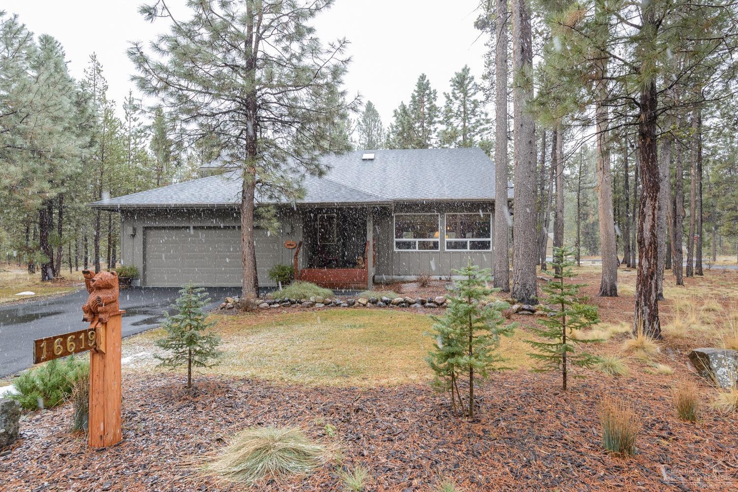 River Meadows finest. Lightly lived in and completely remodeled from top to bottom. High end finishes throughout. Open floor plan, with lofted ceilings and floor to ceiling river rock fireplace. Granite counter tops, 2 master suites - one on the main. 3rd bedroom has its own bathroom. Beautiful corner lot, large deck with hot tub. This is true pride of ownership inside and out. Community pool, tennis, miles of bike paths, private boat ramp, clubhouse and pickleball all within walking distance. This home shows like a model home!