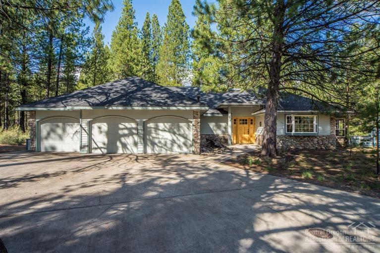This hard to find single level updated Sunriver home on a quiet cul-de-sac is the perfect Sunriver retreat! Close to the Village, SHARC, Fort Rock Park and bike trails, yet there is a feeling of privacy with all the common area surrounding this large lot. Beautifully remodeled including wood and slate flooring, slab granite counter tops, cedar ceilings, rock fireplace, updated bathrooms, high end lodge style furniture package, bonus room, extensive outdoor living area, hot tub and 3 car garage. Sold turnkey