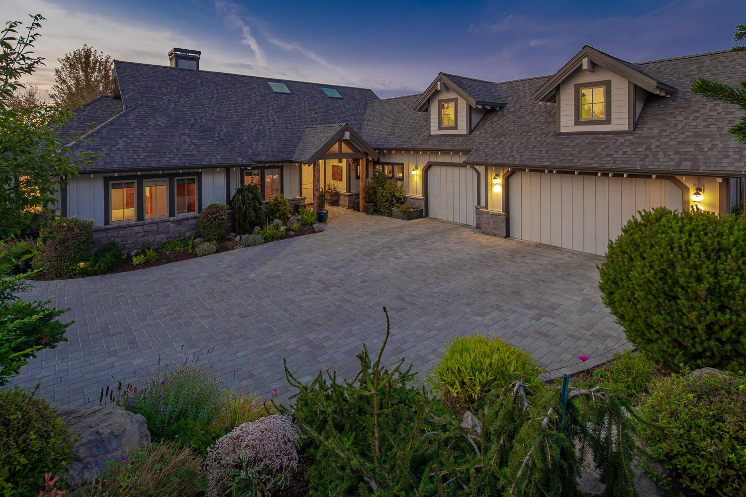 Stunning Cascade Mountain views from this gorgeous custom Cascade Lodge home in Eagle Crest Resort! The great room features a 17' vaulted ceiling with exposed timber trusses, solid granite wood-burning fireplace with gas starter, Ponderosa Forge wrought iron door,  adjacent wood storage area, and juniper mantel. Entertainer's dream kitchen with slab granite countertops, top of the line appliances, and a 9-foot wet bar. 
The master suite boasts a spacious walk-in closet with a built-in dresser, large soaking tub, walk-in shower, and a built-in bench & dressing table. Two additional guest en-suites, den, powder bath, and utility on the main floor.
576 Sq Ft bonus room with full bath on the upper level. 900 Sq Ft garage with epoxy floor coating and 6 large casement windows.
Beautifully landscaped and meticulously maintained garden.
Enjoy 1000+ Sq Ft partially covered raised paver deck in the sun and shade, and
3000+ Sq Ft paver driveway with parking pad for guests. Heat pump water heater.