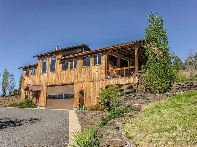 Custom 2000+sf Home Cascade Views Above Deschutes River! Private top of the hill 3Bd/2.5Ba in CRR: wood siding, Blue-Pine interior & plank floors, great room w/wd stv & window-wall views, family/sunroom, country kitchen w/SS-appl & dining room w/pass-thru, main level master w/pvt bath, walk-in + views, covered view deck, 2+car-garage w/10' door & shop, chicken coop, small horse barn w/2-x/fenced runs + Home Warranty!