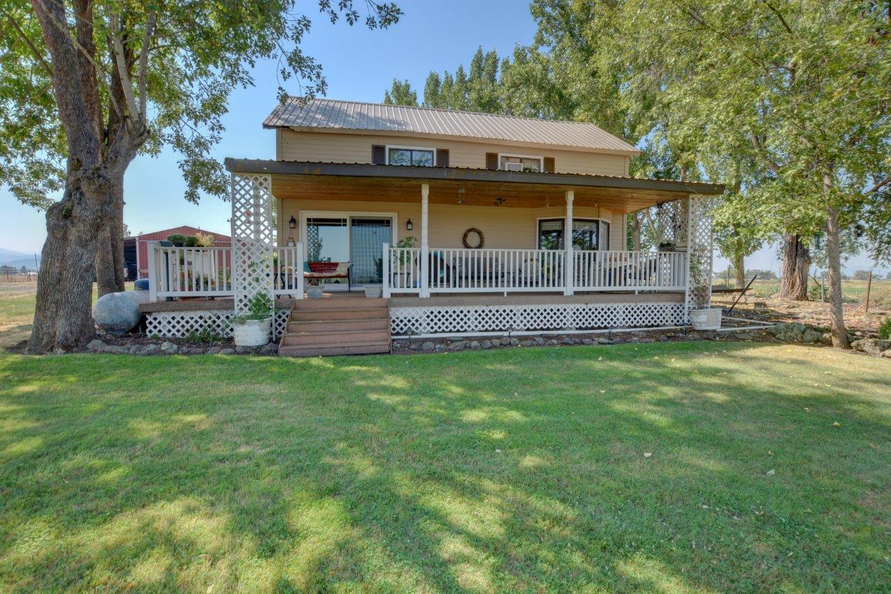 Looking for a place to run cattle, horses and grow your own hay? Or perhaps you are interested in a Vineyard, this property has so much to offer! With 35 acres of irrigation and a year round pond, the possibilities are amazing! Home sets up on a knoll overlooking the beautiful surrounding land and mountains.