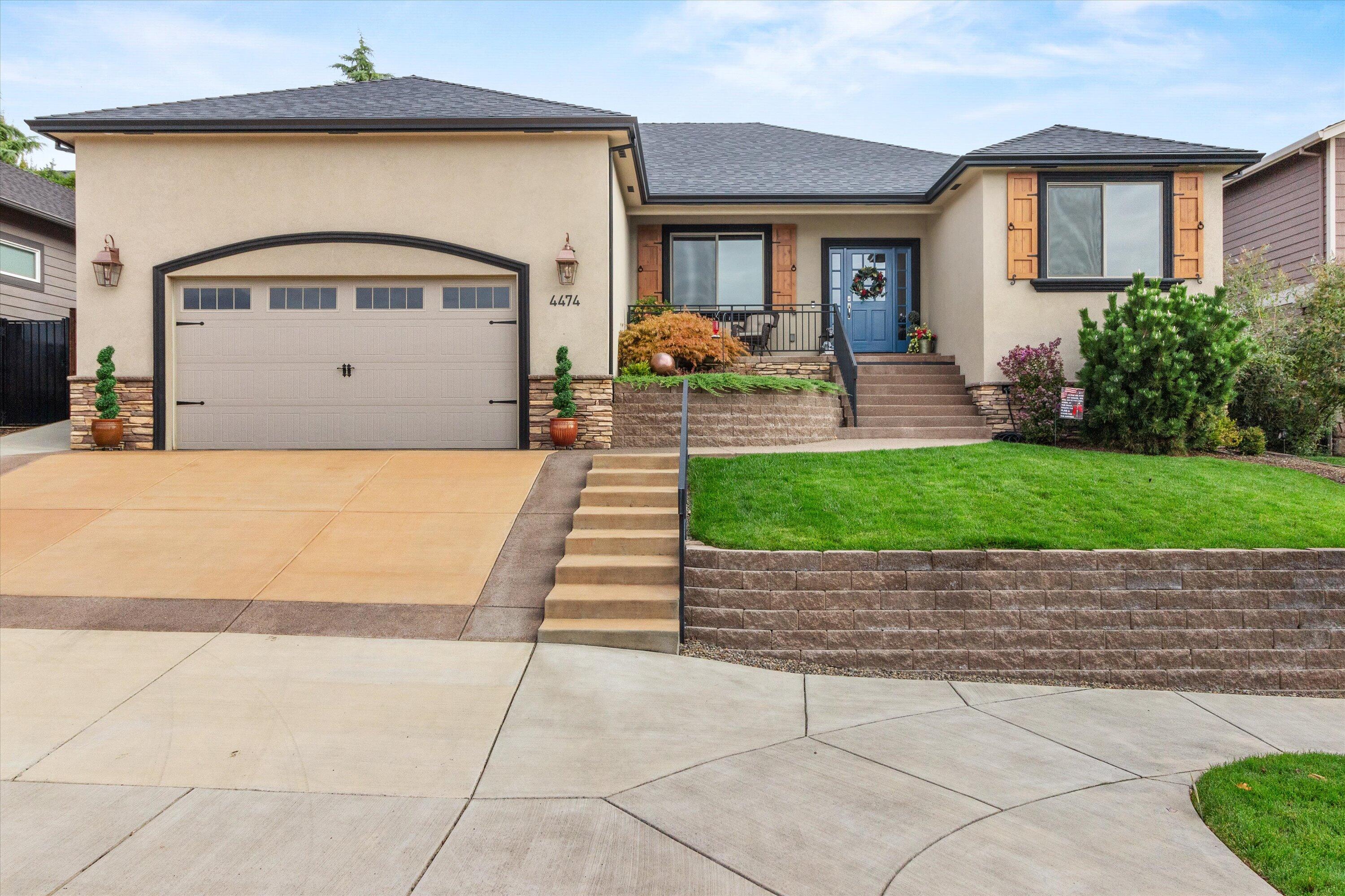 Elegant, single level beautiful home in sought after Vista Point neighborhood of East Medford with amazing views of the city.  4 Spacious bedrooms and 3 bathrooms thoughtfully laid out for a functional split wing floor plan offering abundance of natural light. Great room offers floor to ceiling stone gas fireplace, white built-in bookcases/cabinetry that opens to kitchen, 2 tone center island with granite leathered countertops.  Bosch stainless upgraded appliances, 5 burner gas stove and triple door GE refrigerator included.  This amazing home offers practicality of numerous storage and linen closets plus additional 8 x10 storage shed outside. The primary suite features a large walk-in closet, double sinks, heated floors, and oversize glass frameless shower with floor to ceiling custom tile.  Home is fully landscaped, and many new upgrades have been added to this lovely home.  4 newer TV's will all stay in the home.  Listing Agents have ownership interest in this property