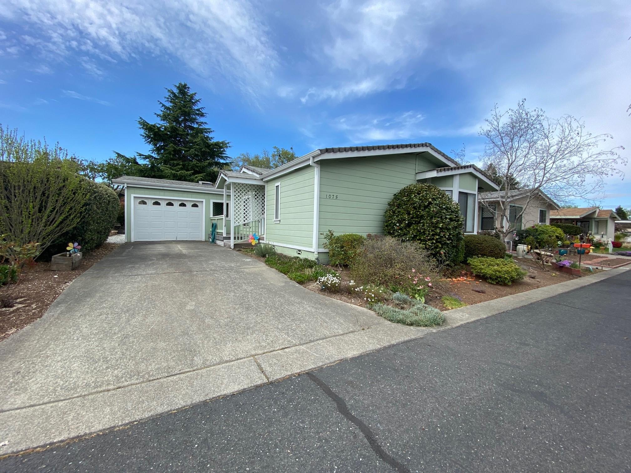 Manufactured home in the desirable Allen Wood Estates 55+ community. 3-bedroom 2 bath 1512 sq ft 1986 manufactured home. Low maintenance yard. The best part is there is no space rent, you own the land. These homes can only be owner occupied, no rentals. $115 HOA dues pays water, sewer and common area/clubhouse  maintenance.