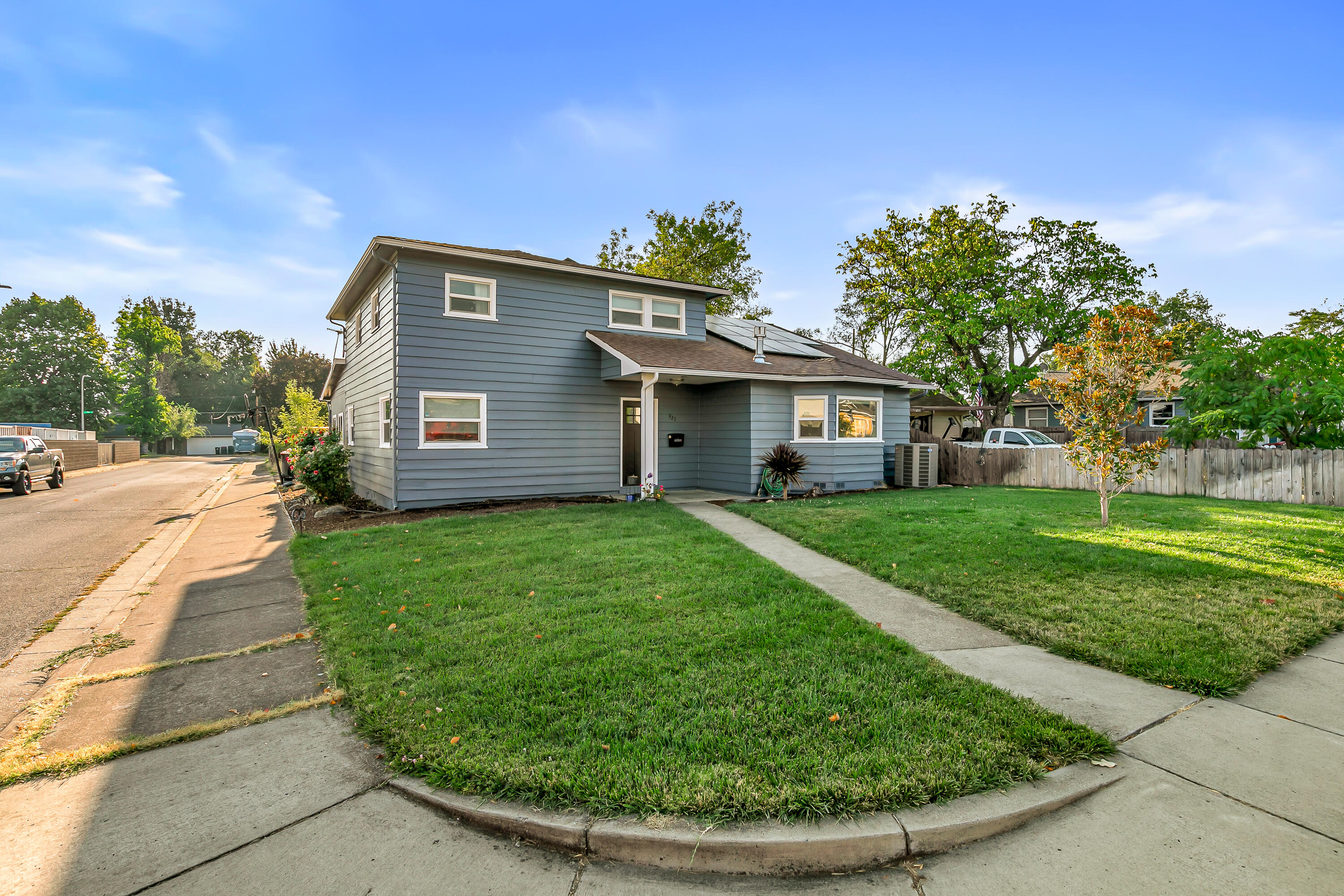 Beautifully updated single-family home with exceptional multi-family potential on a quiet, low-traffic street. Features an open-concept kitchen and living area with updated finishes and hardwood floors. Recent upgrades include remodeled kitchen and living space, new HVAC, new gas fireplace, new carpeting and a recent bathroom remodel, fresh exterior paint, and solar panels for very low utility bills. The versatile bonus space with its own full bathroom offers many possibilities—ideal for a private suite, office, studio, or playroom. Buyers to do their due diligence on potential use. A private and cozy brick-paved courtyard leads to a detached 2-car garage with generous paved parking. A flexible layout, modern updates, and peaceful location make this home a standout.