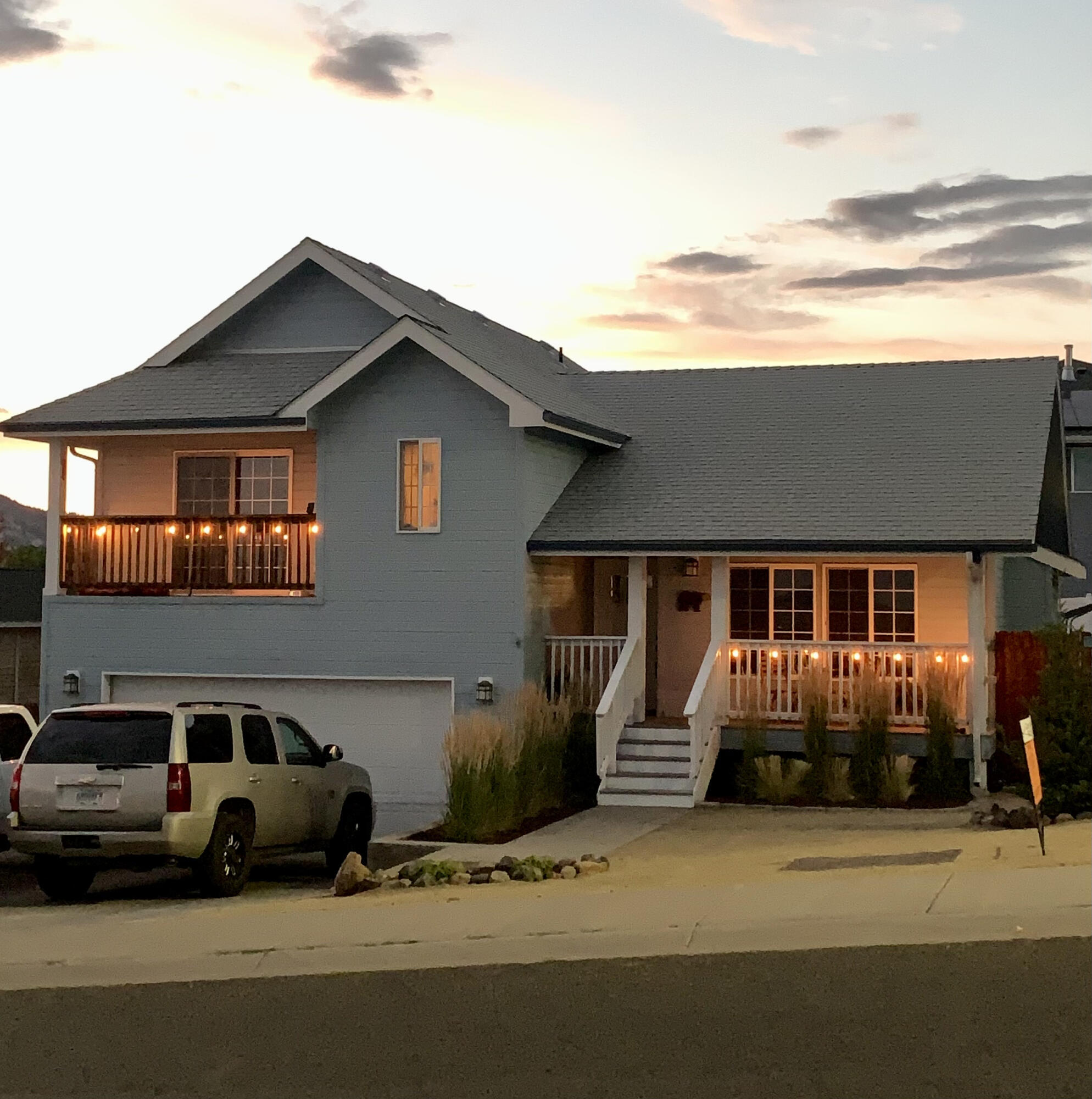 View of Mt Shasta!  The welcoming front porch enters into this split level home to a modern living room with vaulted ceilings. You will immediately feel like you are at home.  The U--shaped kitchen has lots of counter space and storage with stainless steel appliances. Double doors open into the primary bedroom which includes an outdoor balcony where you can enjoy a cocktail and the view of Mt. Shasta.  Bedrooms located upstairs with family room downstairs.  This nice sized lot includes room to park your RV, a recently upgraded large backyard with a newly extended patio, grass and gravel area.  The front yard was also recently landscaped with an attractive xeriscape design to reduce water usage.  Your next home is located in a lovely neighborhood close to shopping, schools and parks.  $375,000.