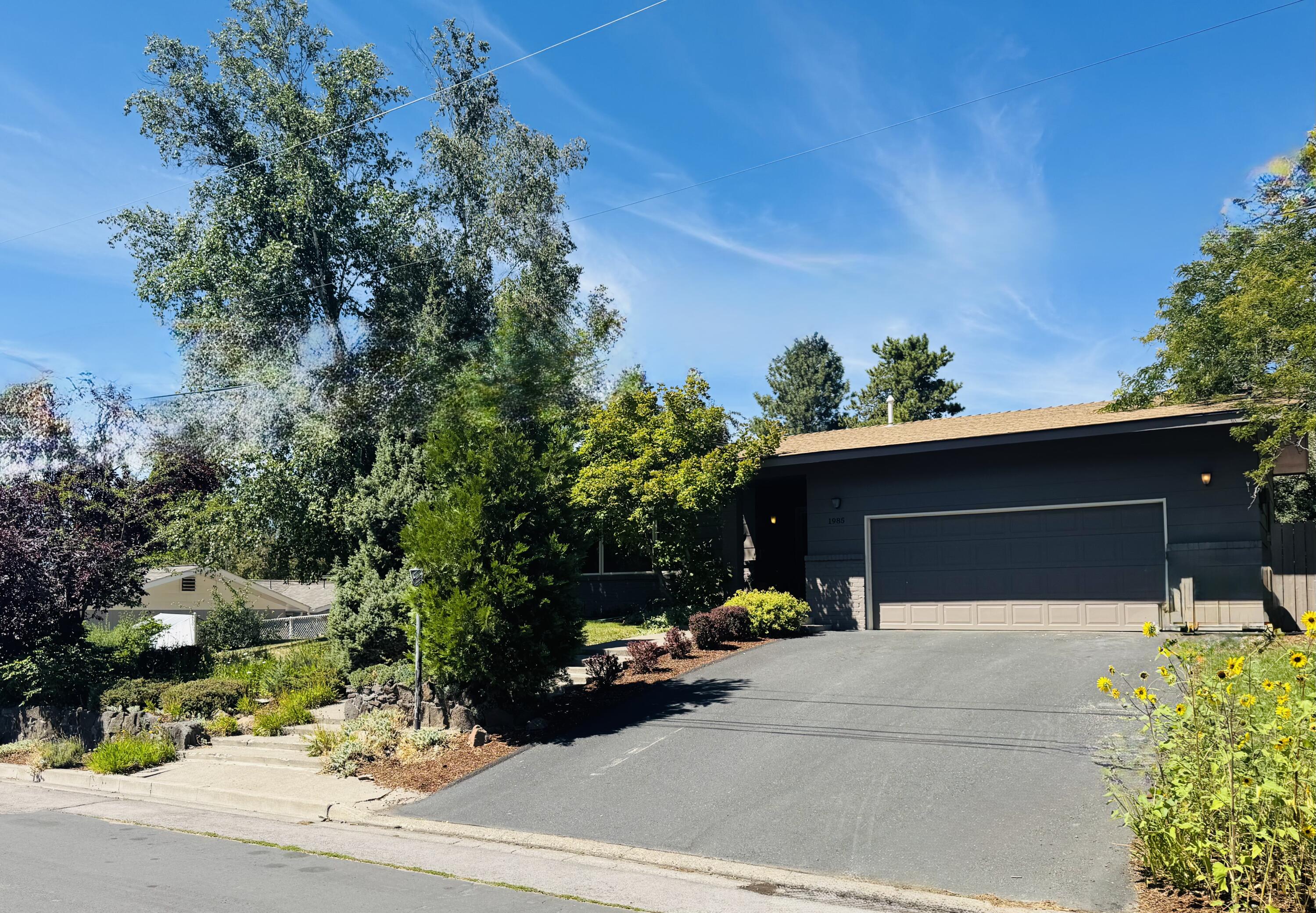 This beautiful ranch style home is ready for its next owner.  It has gorgeous hardwood floors throughout with a perfectly appointed kitchen, lovely cabinets and butcher block counters.  All windows are wood encased and add a wonderful elegance to the home and allow ample sunlight to drench the living space.  This home is located in the hot springs neighborhood, close to Skylakes, OIT, and downtown.