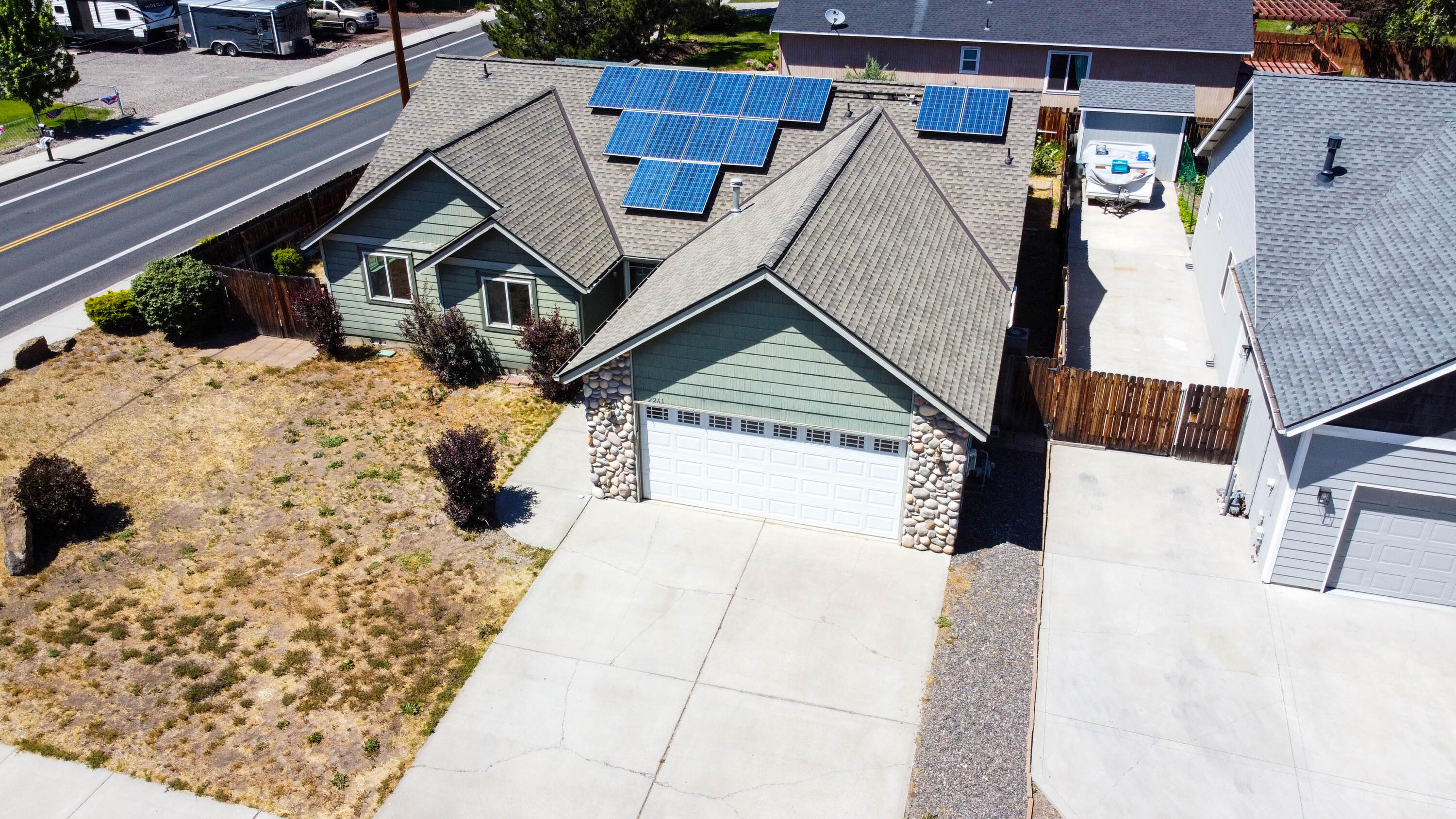 Introducing an extraordinary single family home for sale at 2261 SW Reindeer Ave, Redmond, OR 97756. This spacious 3-bed, 2-bath property boasts a new 50-year roof, solar panels, an office, and a large walk-in closet with built-ins. Enjoy oversized bedrooms, a fireplace, and a garden shed, all without the burden of HOA fees. With a floor size of 1929 sqft and a lot size of 7841 sqft, this home offers plenty of room to live and grow. Conveniently located near great schools and fantastic parks, this is the perfect neighborhood for families. The front and back yards feature sprinkler systems, making it easy to bring back the beautifully landscaped grounds.  Don't miss out on the opportunity to own this magnificent home. Schedule a private viewing and make 2261 SW Reindeer Ave your new address. Act fast, as this property won't stay on the market for long!