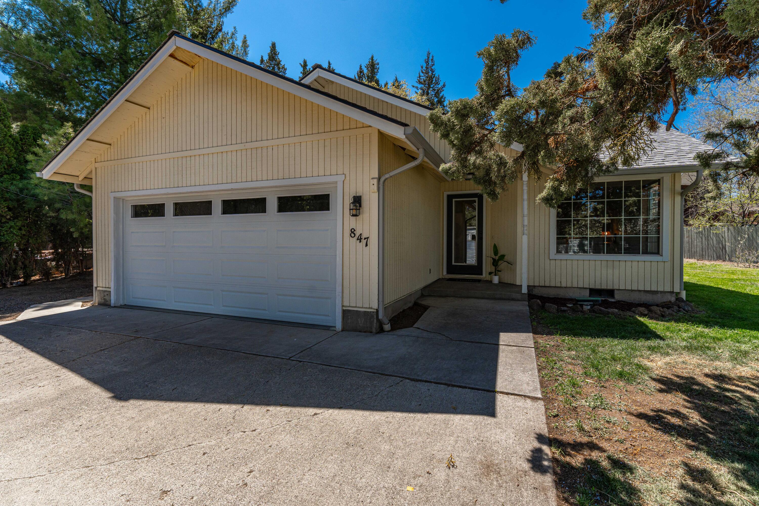 Adorable Midtown Gem on Bend's popular Jones Road!  Nearly 1100 square feet, three beds, two baths with a two-car garage, on a private 1/3 acre fenced flag lot. This charmer also has a detached artist's shed for your home office or hobby area.  The home is a blank slate to design to your own desires, and the park-like property is a gardeners delight. Huge yard with multiple raised garden beds. Lots of room to park an RV on the side.  It has a newer roof, furnace and water heater.  Midtown is the  ''Westside of the Eastside'' and this property is a dream within!  Centrally located in the heart of Bend and just a few blocks from Hollinshead Park and Pilot Butte.