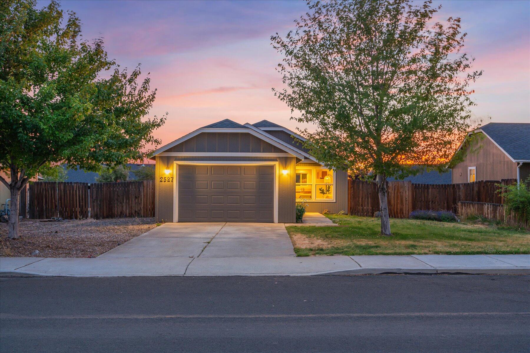 Welcome to this beautifully refreshed 2 bed, 1 bath bungalow - perfectly nestled in one of Redmond's desirable neighborhoods. Step inside to find brand new carpet and fresh interior paint that give the home a clean, modern feel. The cozy floor plan is both functional and inviting - ideal for first-time buyers, downsizers, or as a smart investment opportunity. Enjoy the convenience of a one-car garage plus dedicated parking for a small RV or utility vehicle - a rare find! The oversized backyard offers endless possibilities - whether you're dreaming of a garden, outdoor entertainment space, or future expansion. Located across the street from Diamond Bar Ranch Park, close to schools, and just five minutes from downtown Redmond - don't miss this turn-key and move-in ready gem!