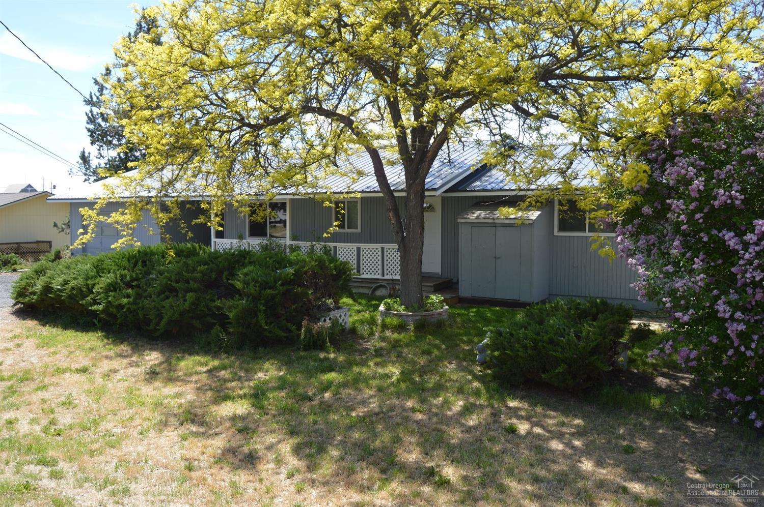 Lots of room in this newly refurbished home. New metal roof, fresh paint inside and out, new carpet in all four bedrooms. Peek-a-boo mountain view. Lots of house, great price.