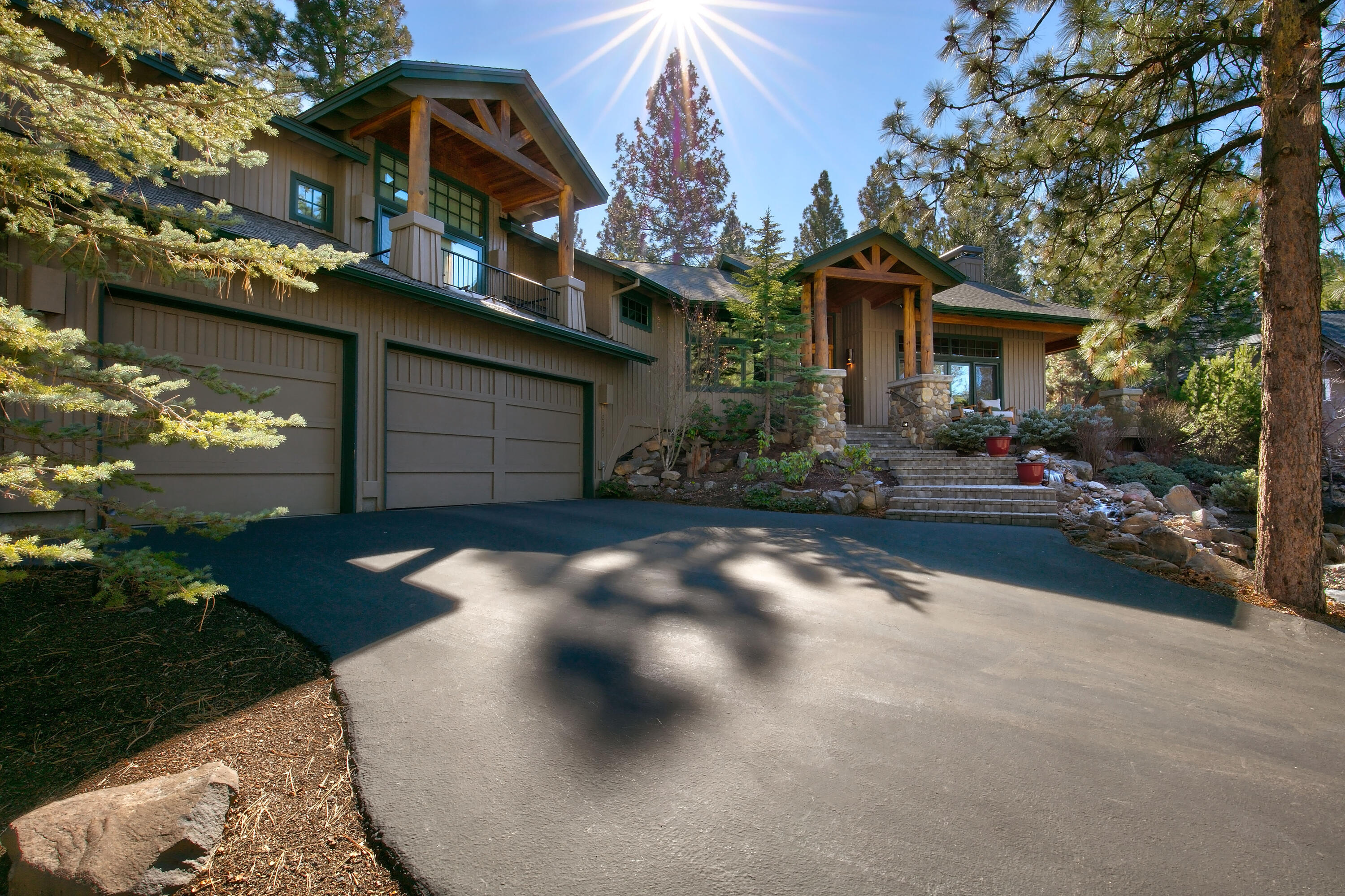 Situated on a private lot in the exclusive gated Awbrey Glen Golf Community, this stunning 2,627 sqft. 3-bedroom, 3-full bath home features vaulted ceilings, exposed wood beams, high-end appliances, and a cozy wood-burning fireplace. This home offers an expansive master bedroom suite, luxurious bathroom with soaking tub, oversized walk-in closet, fireplace, and a private balcony. In the backyard, you'll find a charming casita, perfectly sized at 677 sqft. This inviting guest space includes a full-size bedroom, bathroom, living room with a mini-bar, and a cozy fireplace. Enjoy hosting friends around the large gas firepit on the spacious outdoor patio. For those who enjoy outdoor activities, this property offers an expansive 3-car garage with 1,062 sq. ft. of versatile storage and workspace. This home is conveniently located near Downtown Bend and all the local activities Central Oregon has to offer. Don't miss your chance on this rare opportunity in the beautiful Awbrey Glen Community.