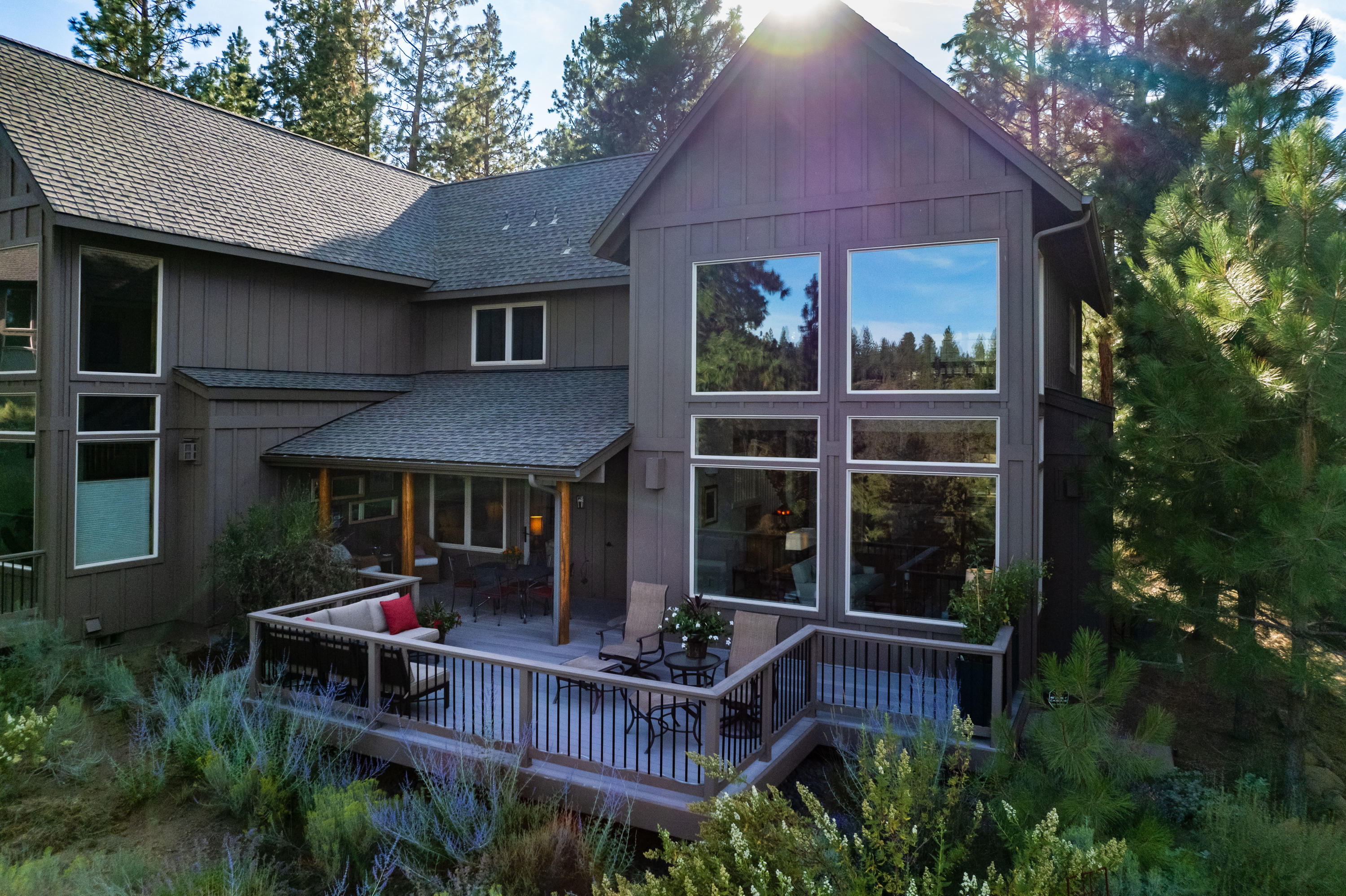 Beautifully updated River Wild townhome, nestled above the Deschutes river!  River Wild offers an unforgettable lifestyle that includes wildlife, miles of trails and the serene river just outside your back door.  Only a few minutes to restaurants, cafes' and shopping, and easy access to lakes, rivers and Mt Bachelor. Featuring a bright open floor plan, with a lovely modern mountain design. This spacious, gourmet kitchen is a chef's delight! Featuring beautiful wood floors, stainless steel appliances, custom cabinetry and island. The great room sets an impressive tone with stunning floor to ceiling windows, that perfectly frame the gorgeous view, as well as a stylish, modern fireplace to cozy up to. The second level includes an additional bedroom and full bath, as well as a large open loft with vaulted ceilings and a view of the river. Enjoy the spacious trex deck, perfect for entertaining, enjoying wildlife or taking in the peaceful sounds of the river. River Wild is the Best of Bend!
