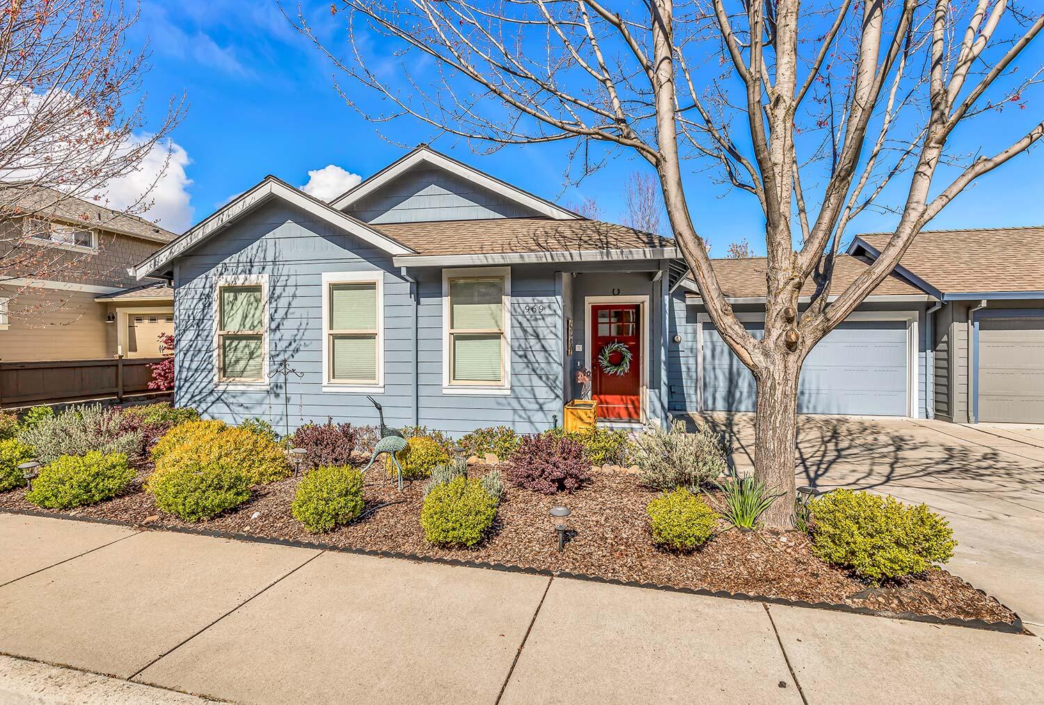 This professionally designed home takes advantage of stunning mountain views through walls of windows from the vaulted living, dining and kitchen area. Great room design with skylights, gas fireplace and custom built-in cabinetry opens to a deck for added outdoor living. Main floor master suite with custom tile shower, double vanity and walk-in closets and views of snow-covered Mt Ashland. The versatile floor plan allows complete main level living while the lower level provides high ceilings for three bedrooms, full bath and spacious laundry room. Lower level contains bonus 14x24 room ideal for a wine cellar or other storage, plus additional patio space, fenced yard/garden and low-maintenance landscaping. Two-car garage and recent exterior paint. This is a must see home!