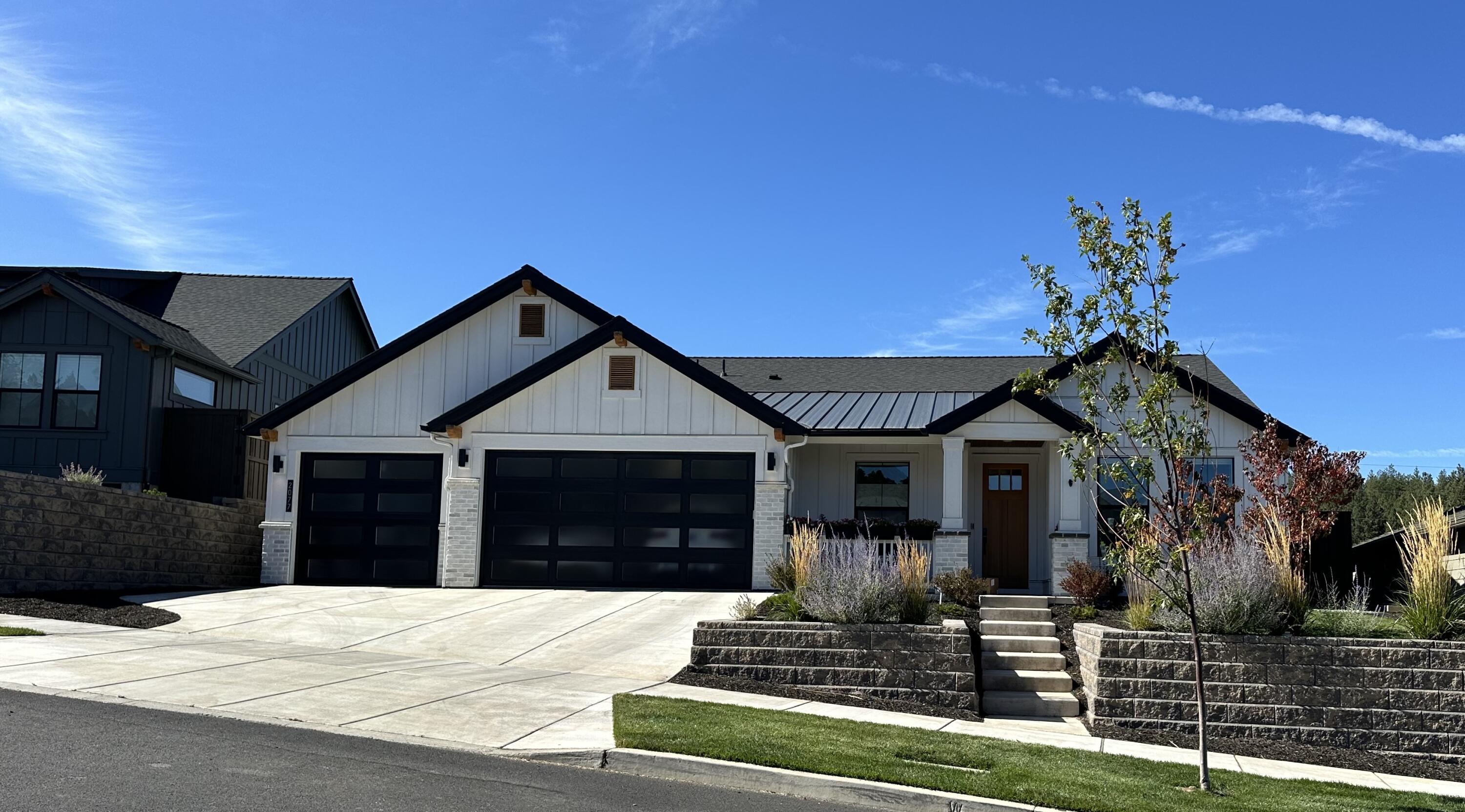 Enjoy this beautiful single-level home with plenty of natural light built by award winning Pahlisch Homes with 3 bedrooms (one primary and one junior suite), 3 full bathrooms, office/bonus room, lovely dining room, and spacious great room with gas fireplace.  High-end features include 8-foot doors, custom built-in cabinetry, engineered wood flooring, large island w/seating & counter-tops with full height kitchen tile backsplash, stainless steel appliances, custom wet bar & wine frig.  The primary suite has a new custom-built drawer system; walk-in closet designed by California Closets, double-vanity, beautiful tiled, steam shower, bidet, soaking tub, and access to the expansive paver patio with Montana gas firepit.  Low-maintenance landscaping, sprinkler system & green house with zoned water.  Three car garage with epoxy floors, built-in cabinets & dog wash. Live on the west side! Close to shops, restaurants & recreational trails!