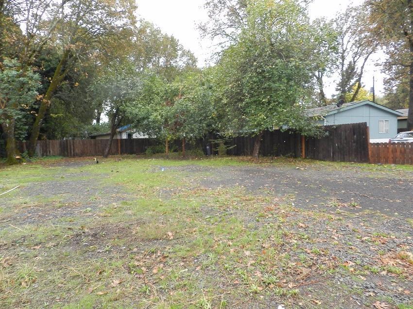 Searching for a nice level lot to build a house on or put a manufactured home on? This is it!! Really nice .13 acre lot in a subdivision with a mixture of newer construction as well as older homes the wonderful town of Shady Cove. Shady Cove has the river running through and is known for white water rafting trips, as well great fishing holes near by! Great little recreational town with restaurants and about 20 minutes to Medford. The lot is on a well and all of the utilities are on site already, but buyer may want to look into the potential for hooking into the community water system. There previously was an older mobile home that has been removed. Seller is related to listing agent.