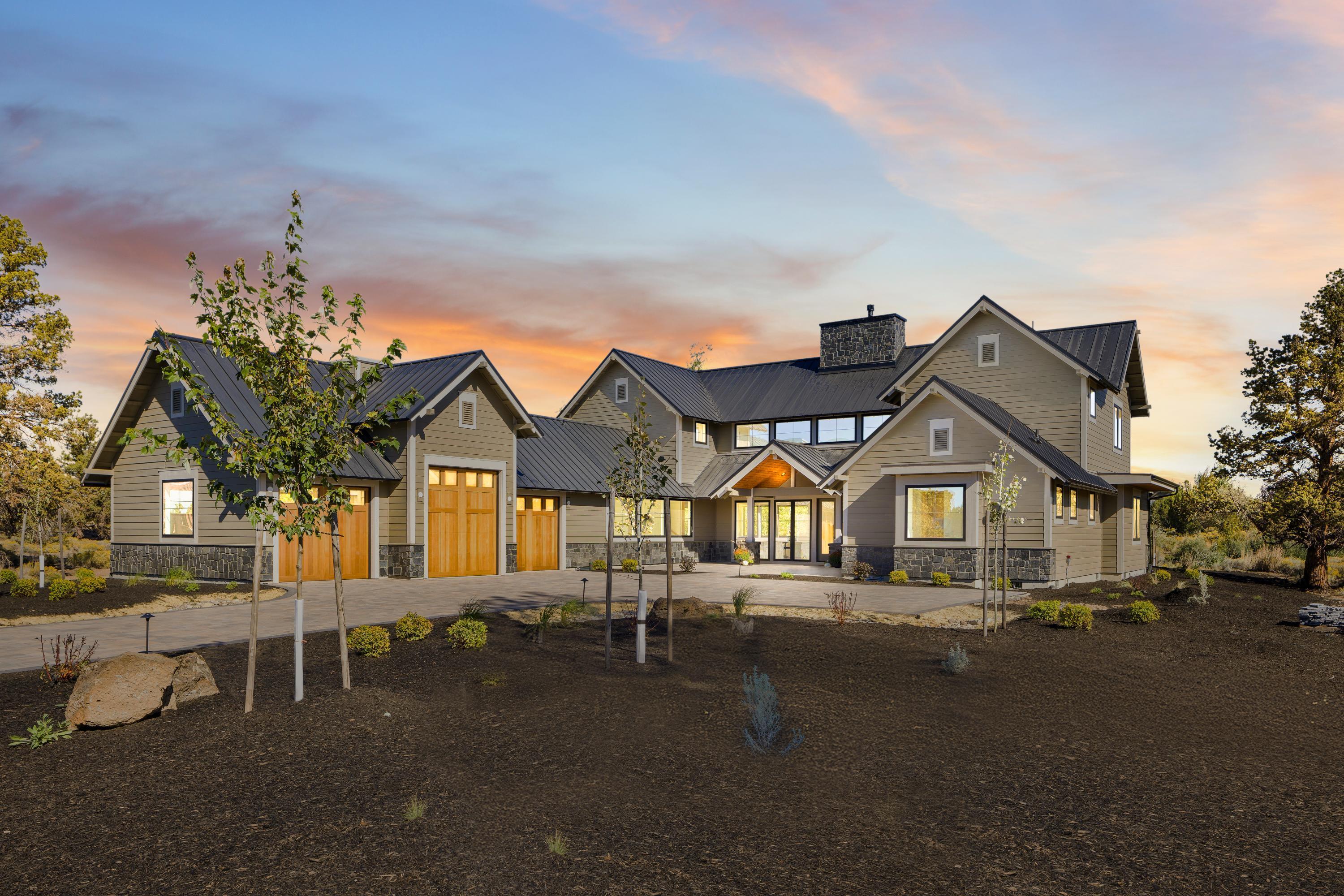 Step into the perfect fusion of Northwest charm and modern Prairie design with this stunning two-story residence. Featuring 3 bedrooms and 3.5 bathrooms, this home is a masterpiece of architectural elegance. The three-car garage, complete with an RV bay door and 10-foot tall ceilings, provides ample space for all your vehicles and toys. Enter through the courtyard entry and discover a primary suite on the main level, offering privacy and convenience. The open floor plan seamlessly integrates room separation with 20-foot ceilings in the great room, creating a grand and inviting space. A see-through fireplace adds warmth and ambiance to both the entry and upstairs areas. Upstairs, two additional suites await, each offering comfort and style, with picturesque views of the main pond. This home is the epitome of modern luxury, offering the perfect blend of functionality and sophistication for your Northwest lifestyle. Required Pronghorn Premier Club Membership cost $115,000.