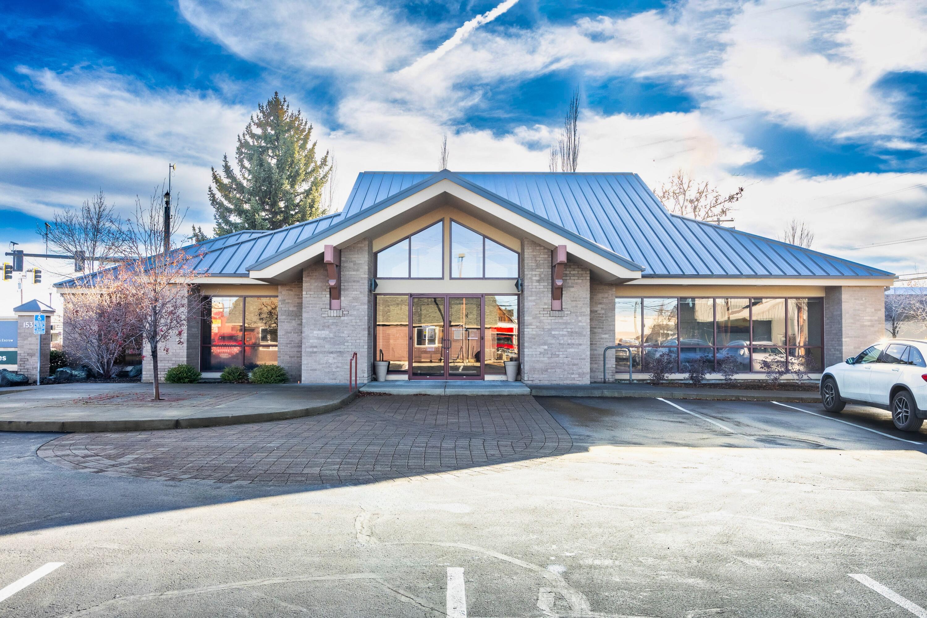 100% leased to two esteemed tenants, Edward Jones and Western Title and Escrow, both on triple net leases. This building combines ease of management with consistent and reliable income. 5.23% Cap Rate. The modern architecture, along with its low-maintenance and well-maintained premises, offer a professional and inviting environment for tenants and visitors alike. Complemented by monument signage, the property maximizes exposure in the Downtown Area. 153 SW 5th Street is an impressive office building spanning 4,138 square feet on a 0.35-acre lot. Situated at the signalized intersection of 5th Street and Black Butte Boulevard, this property enjoys unparalleled visibility and accessibility. Its prime location within Redmond's thriving community, paired with the quality of its tenants and the stability of its leases, positions this investment as a coveted asset. Don't miss this chance to acquire a solid, income-generating property in a dynamic and growing locale.