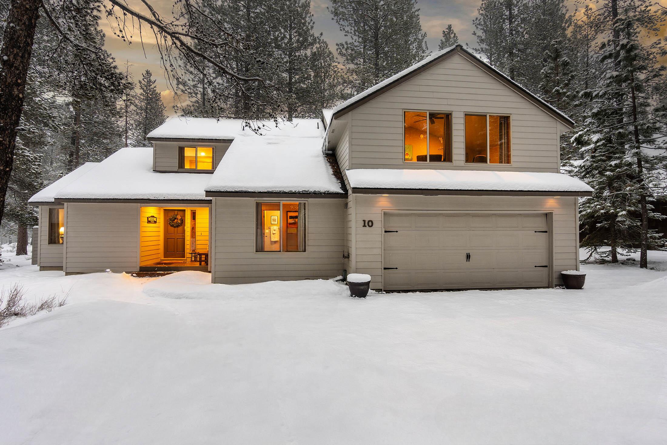 Welcome home to this serene retreat located in the heart of Sunriver backing to forested common area that gives a sense of living in the pines. This well-appointed 2,620 sq. ft. home exudes mountain charm and creates a warm welcome for family and friends with open flowing living spaces and fantastic separation of sleeping areas. Room for all with 5-bedrooms (2-primary suites on main), bunkroom, and 4-baths. Gourmet kitchen with granite countertops, stainless appliances, and plentiful prep space offers seamless entertaining with multiple doors to the deck and BBQ area. Relax in nature and watch wildlife from the expansive deck and paver patio. Soak in the hot tub under the stars after a day of play. Oversized 2-car garage with workshop area. Uncommon parking for 7-vehicles. Updates include new roof, tankless water heater, LVP flooring, and paver patio. Proximity to Ft. Rock Park, bike path and the resort amenities make this a multigenerational oasis. Create your Sunriver legacy