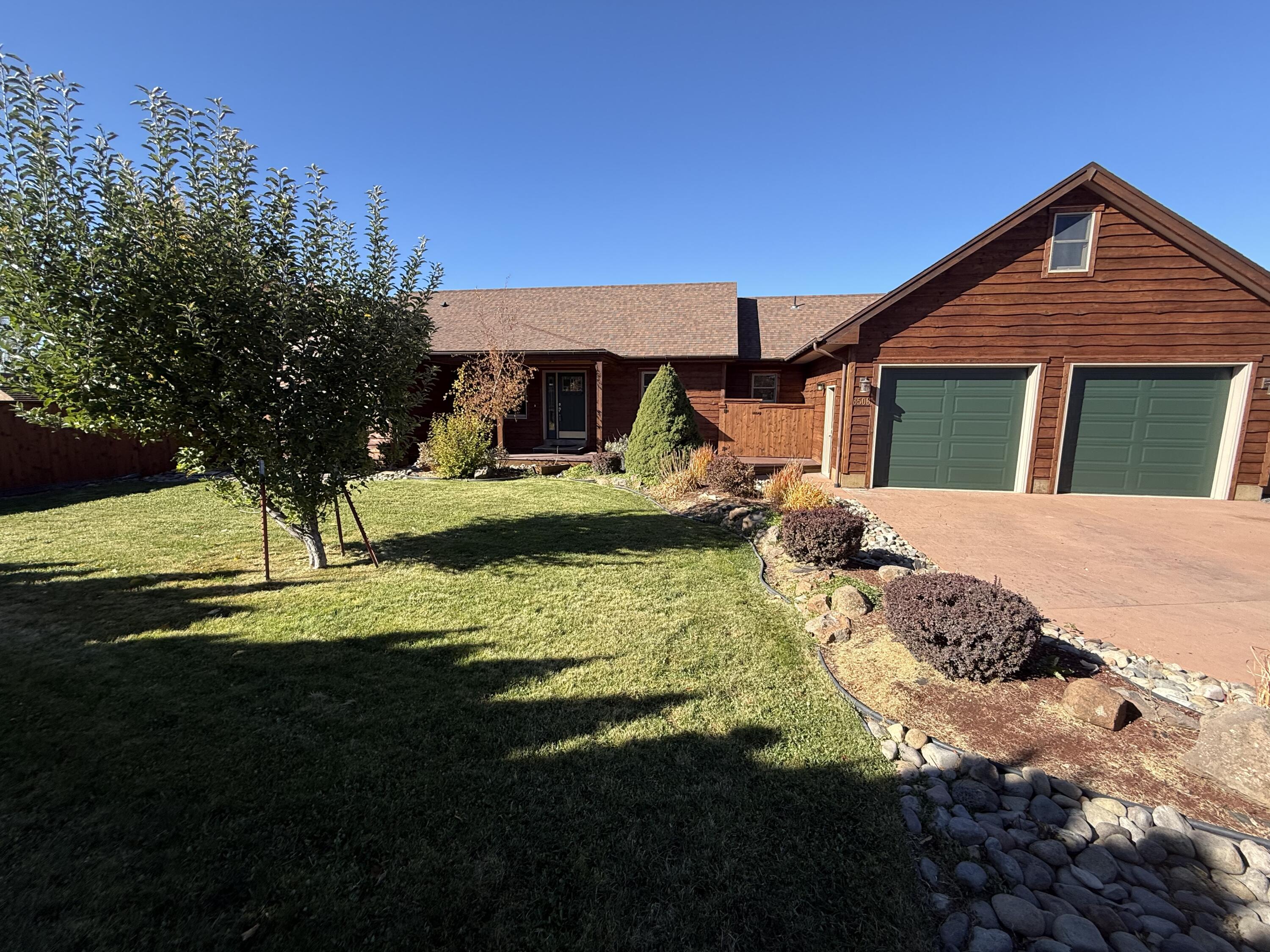 Custom-built home in a quiet Cul-de-sac in a nice neighborhood. This home is located near Klamath Community College and OC&E walking trail. This 4 bedroom, 2.5 bath sits on an oversized lot. It has a two car garage and large RV parking with full hookups, a garden workshop, a wood shed, a children's play house, a beautiful garden area and private backyard with a large partially cover deck. The maintained and landscaped with underground sprinklers in both front and back yards. There is a gas fired hotwater heater with radiators through out the home, providing quite and comfortable heat. The   kitchen has a gas cook stove, granite countertops, cherry oak cabinets. The yard is very well home is also equiped with central air conditioning.