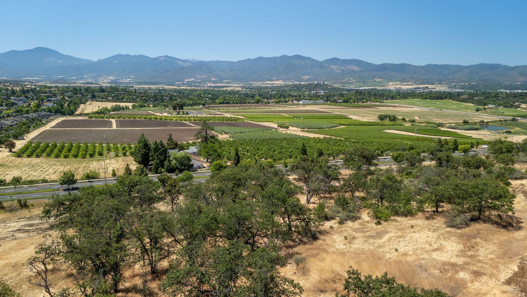 Explore an exceptional investment opportunity in desirable East Medford. PHASE 3 at Red Tail Heights is an approximately 4 acre parcel of vacant land ready for development. Zoned SFR-4/SFR-2 for 11 +/- residences, this unique property promises significant potential for developers and investors alike, made easy with planning and permitting (annexation, zone change, temporary subdivision plat) already approved.  City streets and public services are accessed at three locations. Initial civil engineering work for streets, sidewalks, sewer, and storm drains are completed, along with geotechnical engineering and a a traffic study. Breathtaking views. Convenient to amenities in Medford, Ashland, and Historic Jacksonville, this is a prime opportunity to cultivate a vibrant community in a picturesque locale!