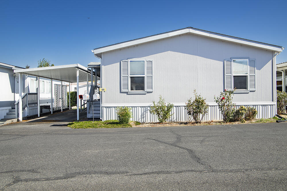 Nestled within a serene park offering tranquil river access and picturesque views, this charming, well-cared-for, 1,620-square-foot, three-bedroom, two-bath manufactured home showcases a spacious and bright split floor plan. It is complete with a formal dining room, an additional eating area, and ample storage. Outside, you'll find a welcoming deck, a storage shed for all your extras, and a convenient ramp for easy access. In addition to river access, park amenities include a Clubhouse, Library, and Garden area for residents to enjoy. Make an appointment to view this gem today!
Home is being sold in its ''as-is'' condition.