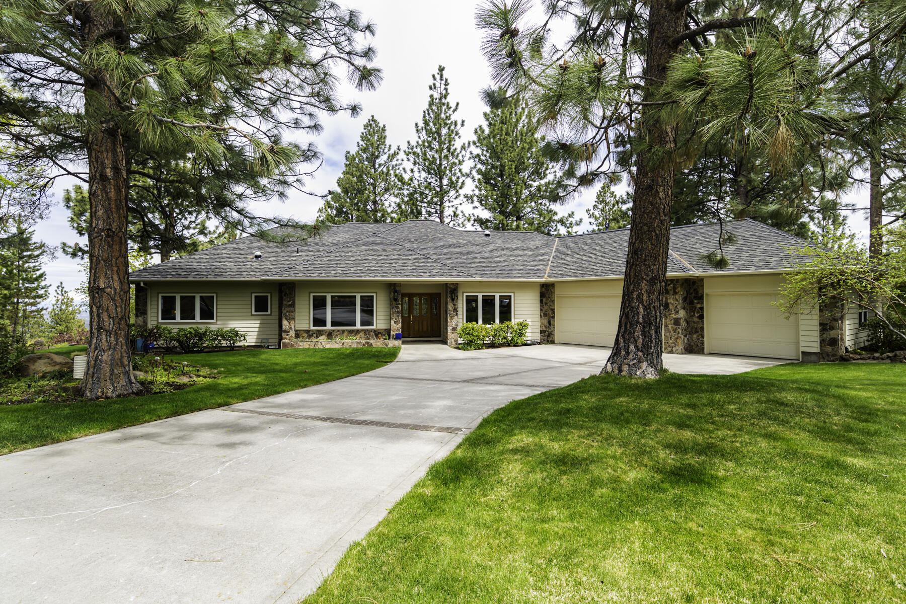 Luxury single-level home in a private treed Awbrey Butte location with stunning postcard- perfect Cascade mountain views. New tile welcomes you at the entry. Premium finishes include 6'' base, 4'' crown molding, new hardwood floors, all new custom-built kitchen w/Thermador appliances including convection & steam ovens, induction cooktop, pot-filler, glass door cabinets w/lights & hidden drawers. Light-filled windows are at every turn. The separate primary suite includes a tiled shower, jetted tub, and dual sinks. 
Restore and relax on your paver deck overlooking gorgeous landscaping Mt. Hood & Mt. Washington views! Ample storage & parking in the 3-car garage on this roomy .67-acre property. Truly a remarkable find!