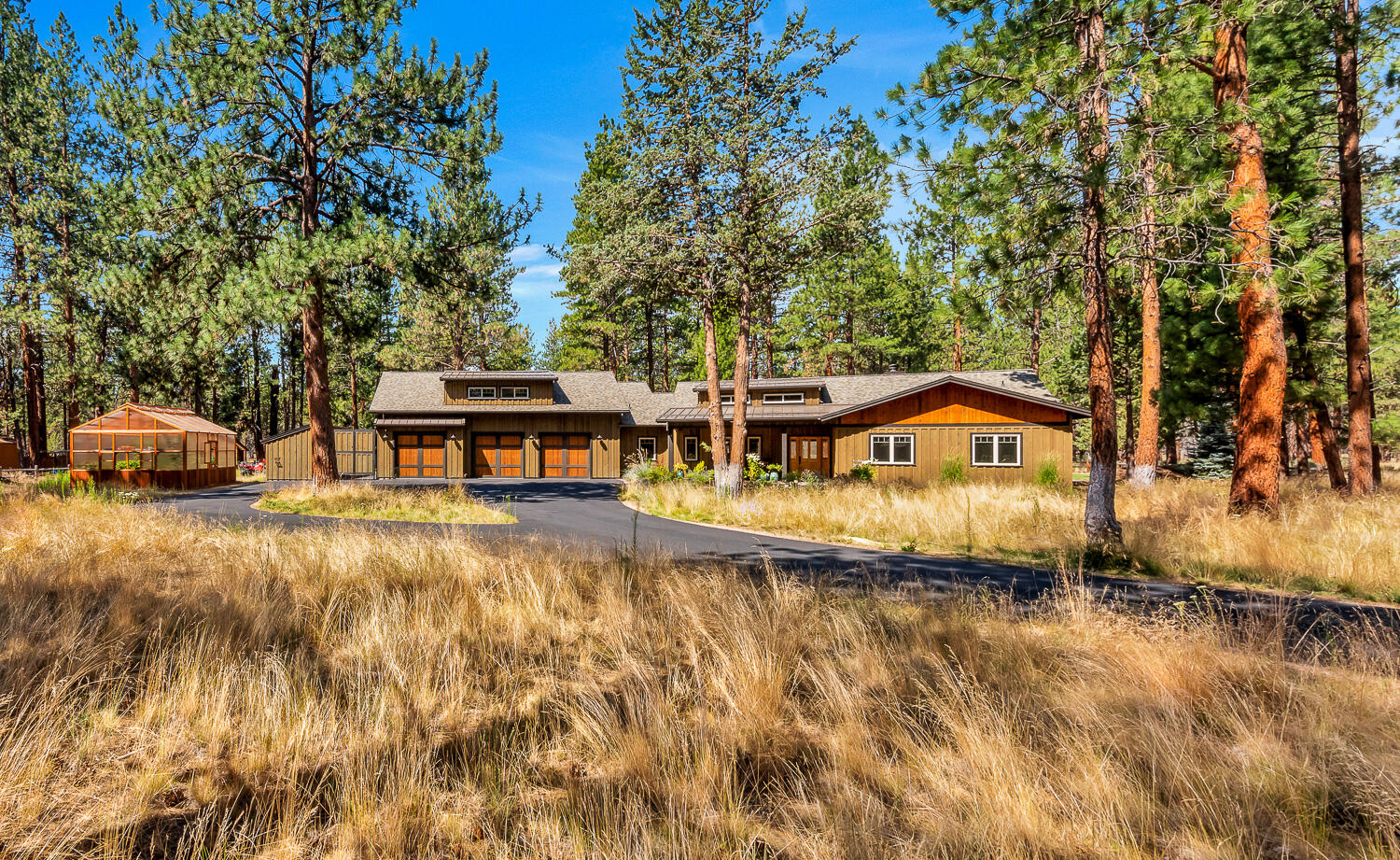 Custom-built NW Craftsman home bordering 1000's of miles of National Forest with cul-de-sac privacy. Interior features: Open floor plan; Primarily single-level with enormous upper bonus room; Solid hardwood flooring; Beam & wood accents; Large gourmet kitchen with high-end stainless appliances; Huge island; Abundant soft-close cabinetry; Stacked rock fireplace with wood storage; Wood burning fireplace; Large primary bedroom with walk-in closet; Heated tile floors, tile walk-in shower & patio access door to the jacuzzi in primary bath; Knotty Alder solid doors, closet doors, casing & granite countertops throughout; Central vac; Security system. Exterior Features: Extra deep 3 car garage with one bay separated & built-in storage; High-end greenhouse with raised beds/irrigation; RV parking/hookups; Storage sheds for toys/tools; Large circular paved driveway; Invisible fence; Underground irrigation; Board and bat cedar siding; Unique pond bordering paver patio; Large covered paver patio.