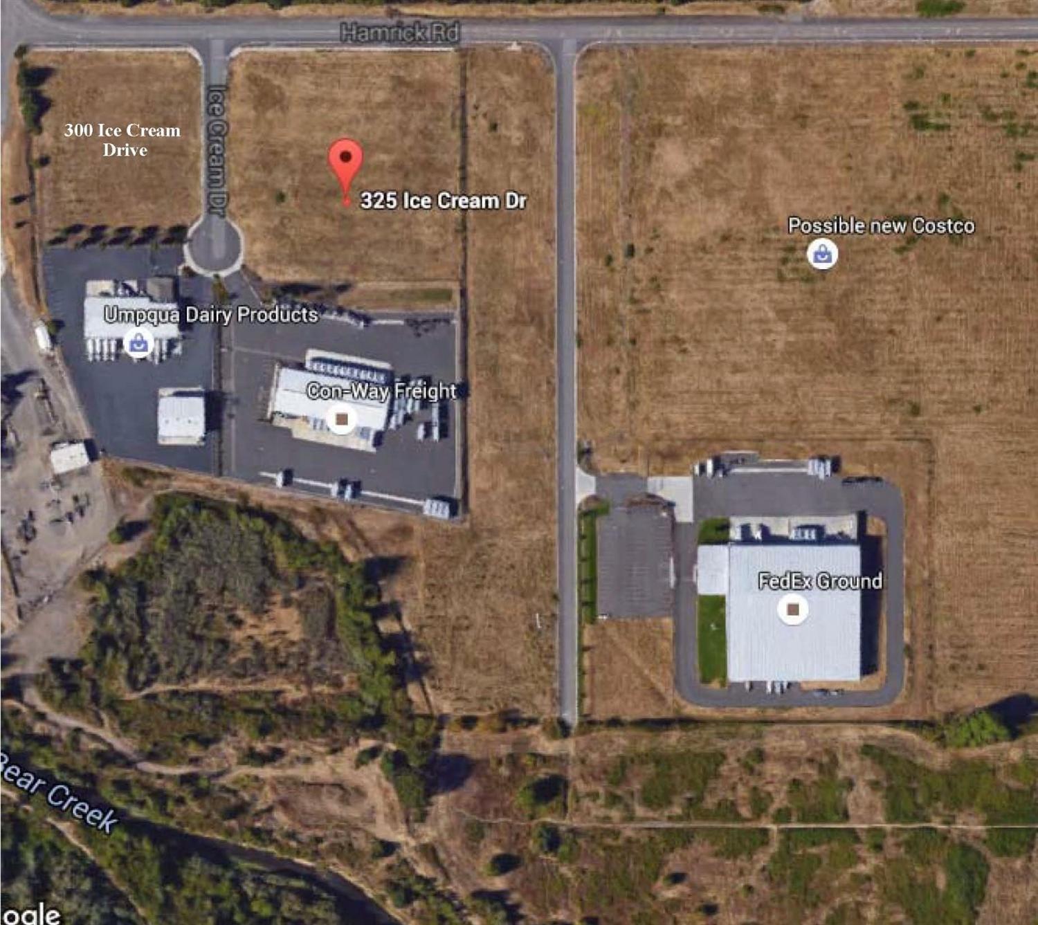 Vacant Lot, level and over 360 front feet on Hamrick Road. Sidewalks in. Survey, topo, utility locates, geotech available. Excellent visibility and less than 300 feet to Costco entrance.