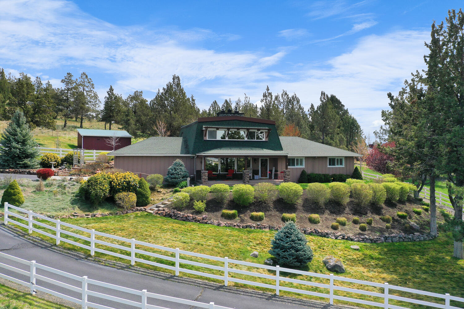 Highly motivated sellers, bring all offers.
Beautifully updated home on 2.34 acres with stunning Cascade Mountain and farmland views! The brand-new kitchen shines alongside a cozy new pellet stove and a living room featuring a rock fireplace and wood stove. Enjoy 3 bedrooms and 2 baths on the main floor plus a huge downstairs family room with a half bath. Upstairs offers a gorgeous bathroom with a soaking tub, walk-in rock shower, double vanity, a large bedroom, and a living room with a massive rock fireplace—a perfect private sanctuary or luxurious primary suite. You'll love the abundant storage and closet space throughout the home. Outdoor spaces include a covered front deck for sunset views and a private back deck with a gazebo ideal for entertaining. Property features irrigated pastures, a loafing shed, and a barn/workshop with loft and lean-to. Gated, paved driveway adds extra convenience. Schedule your tour today!