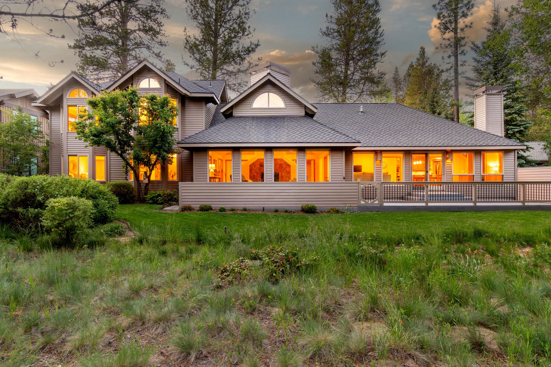 Welcome home to this serene retreat on almost 1/3 acre backing to the 6th fairway of the Woodlands Golf Course. This well-appointed, sunshine streamed 2,747 sq. ft. home offering 3 bedrooms and 2.5 baths, creates a warm welcome for family and friends with an open flow living area, vaulted ceilings, and new solid oak hardwood floors. Quality craftsmanship and gorgeous architectural features abound throughout this mountain getaway. Enjoy blue skies and warm summer breezes on the spacious Trex deck in the backyard featuring an enclosed dog run and garden area. Soak in the private hot tub under the stars. Store your gear in the oversized 2-car garage! New HVAC system, exterior paint, repaved driveway, kitchen appliances, toilets, and duct cleaning and sealing provide peace of mind. Easy access to National Forest Land, the Deschutes River, bike paths, and resort amenities makes this your basecamp for adventure. Sold turn-key and ready to enjoy! Never rented. Create your Sunriver legacy!