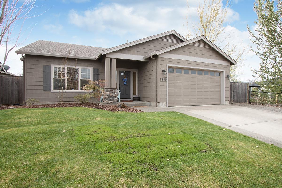 Massive RV Parking (enough for a 5th wheel, car and trailer) , Large backyard, vaulted ceilings, This home features 3 bedrooms 2 full baths with an open floor plan. The gas fireplace has granite surround to match the counter tops in kitchen. A covered patio out back is great for entertaining.