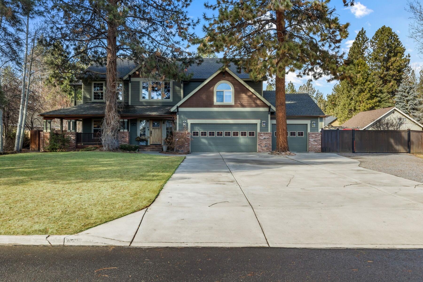 Welcome to your new home in the desirable SE Bend neighborhood, Ponderosa Estates. This residence offers a perfect blend of comfort, style, & functionality. 4 beds, 2.5 baths, and 3,258 sq ft of living space, this property is set on .47 acre. The family room is a cozy haven featuring a brick surround gas fireplace, 1/4 sawn white oak built-in shelving, & hardwood floors, creating an inviting space for gatherings & relaxation. A valuable addition is the 1,440 sq ft heated shop, including 3 oversized garage doors, 100-amp service panel, & a hobby room. Ideal for car enthusiasts, hobbyists, or those in need of ample workspace. Outside discover the mature landscaping, the year-round water feature and the wrap-around porch that provides the perfect spot to relax & enjoy the surroundings. Copper gutters add elegance & durability to the exterior. Don't miss the opportunity to make this property your ownâ€”a perfect blend of comfort & practicality awaits in this private Bend neighborhood!