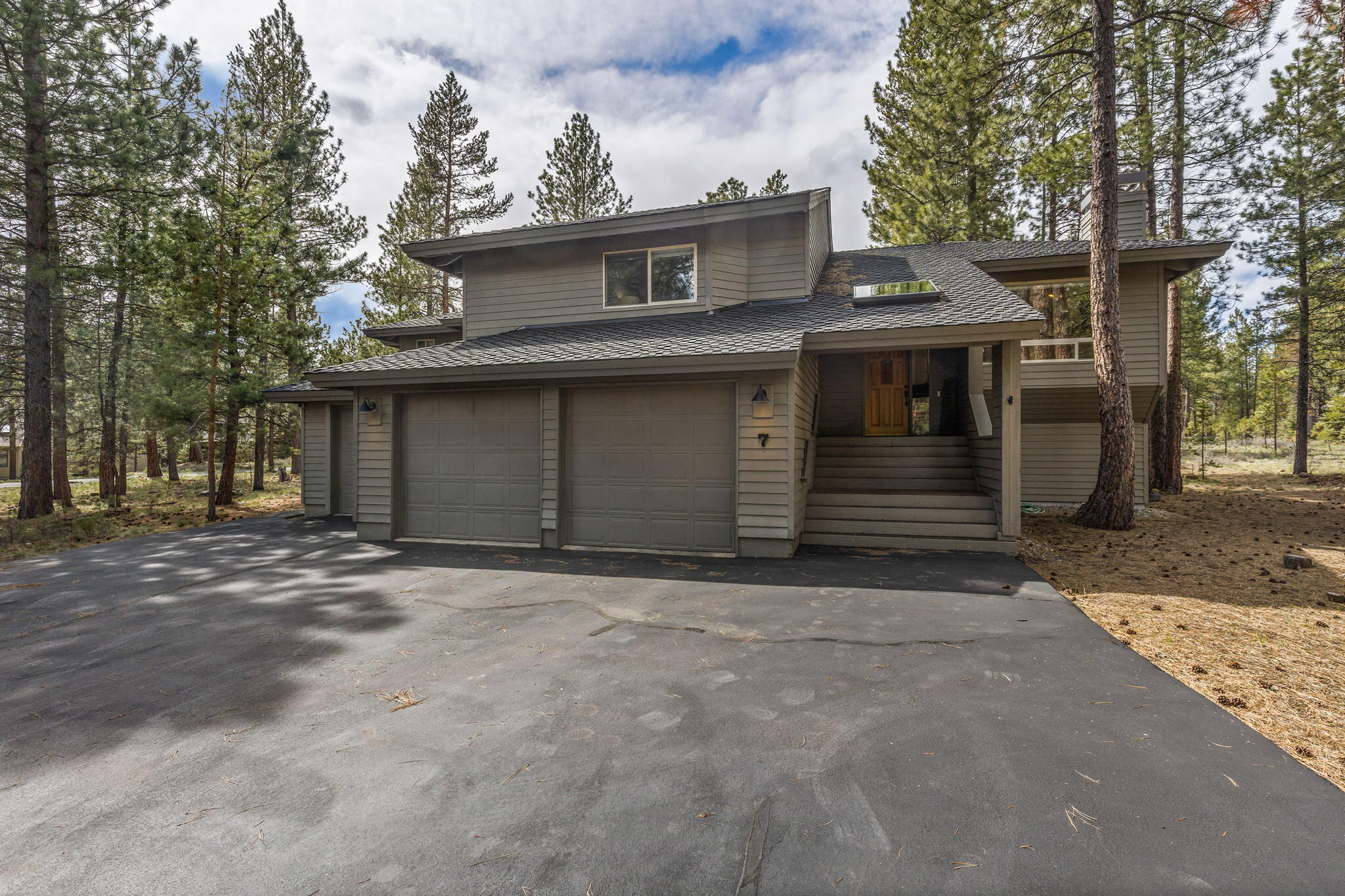 Turnkey 5 bedroom, 3.5 bath Sunriver vacation home! Updated in 2022 including all brand new stylish furnishings, hot tub and exterior paint. Set up for reverse living with a spacious great room featuring exposed beams and 2 master suites on the main level. A true chef's kitchen with granite counters, double oven, a huge island and walk in pantry. Enjoy outdoor living on the expansive trex upper deck and lower stamped concrete patio. The main master suite has a beautiful tiled walk in shower, oversized soaking tub and pellet stove with stone surround. Downstairs is a huge game room with pool table, bunk bed room, 3rd ensuite and a butlers pantry. Oversize 3 car garage with lockable owners' storage. This home is perfect for large groups and has been a very successful nightly rental, with current bookings available to transfer to new owner. Home is being offered fully furnished, rental financial proforma available upon request.