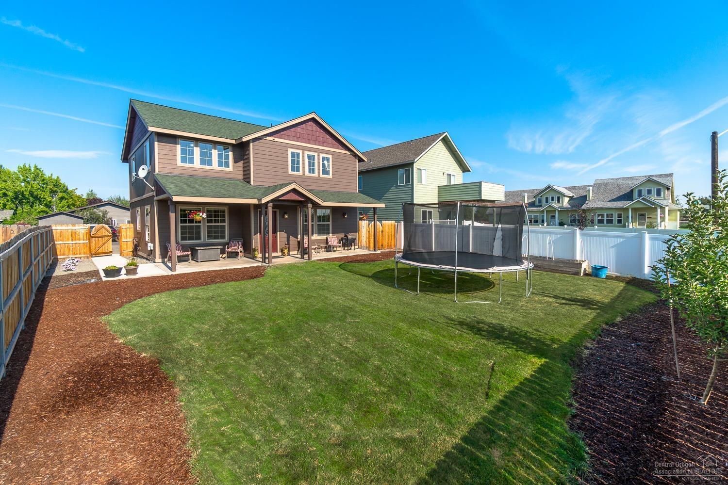 Great room plan w/space to entertain inside & out! A/C, 3 bedrooms, office AND bonus room (or 5 bedrooms), 2 full baths + powder. Hickory HW floors, newer carpets. Gas fp in living room. Open kitchen w/gas range, dbl oven, tile counters & eating bar. Enjoy views of Cascades from upper deck & bonus room w/skylight. Master Ste w/spacious bath, dbl sinks & walk-in closet. High efficiency gas hot water heater. Plumbed for central vac. Fully fenced yard, RV parking. SS refrigerator, washer & dryer included!