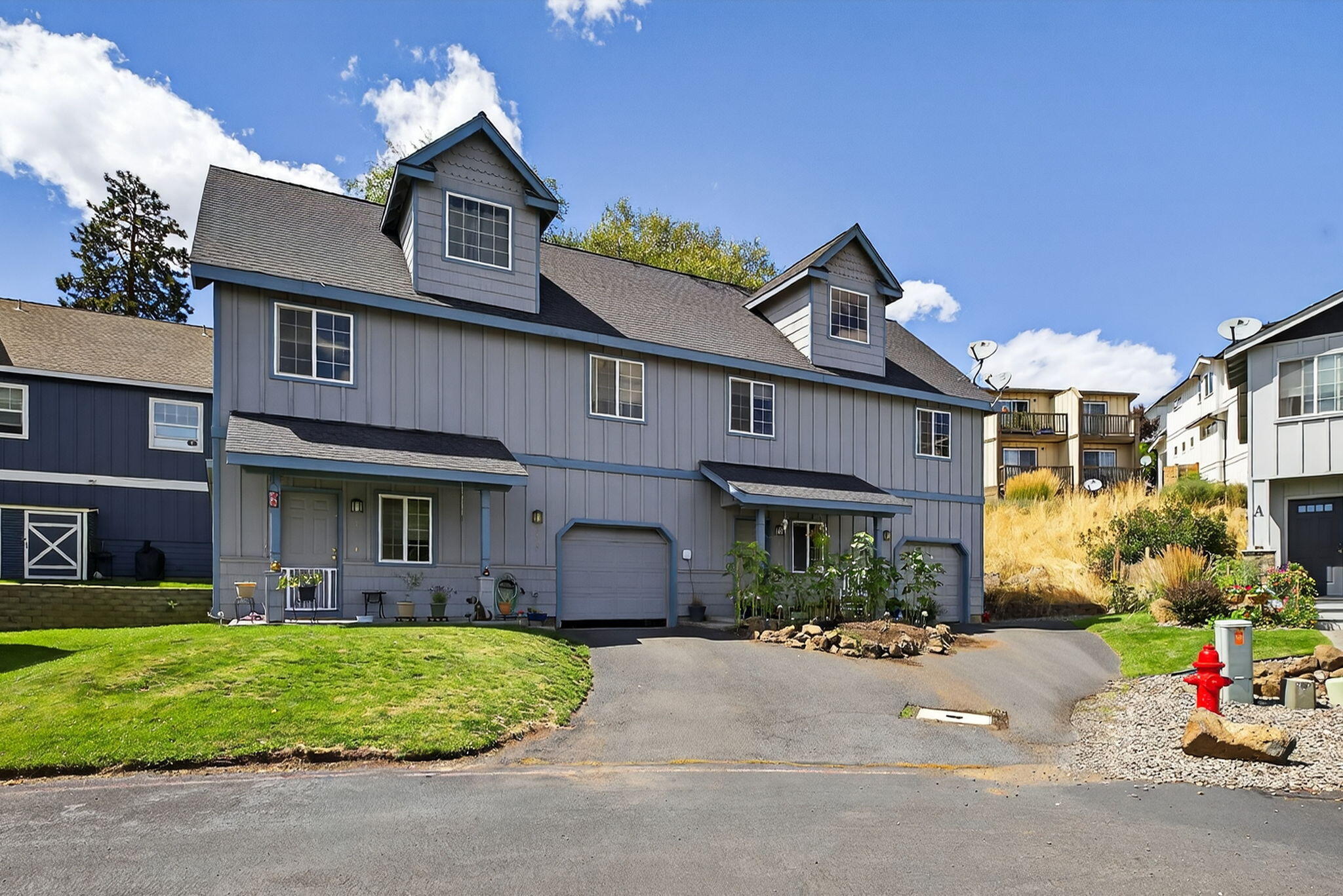 Spacious, well-kept duplex ideally situated at the base of Pilot Butte State Viewpoint and Park. Each side offers 1,479 sq. ft of living space with 3 bedrooms, 2.5 baths, and a generous bonus room that can serve as a 4th bedroom. The main level features an open-concept layout with a comfortable living area, kitchen with breakfast bar, half bath, and direct access to the attached single-car garage. Upstairs, the primary suite boasts a walk-in closet, private bath, and balcony. Outdoor amenities include back patios and lawn space for each unit. With a proven rental track record and close proximity to parks, trails, shopping, and medical services, this property is a strong investment opportunity. For more details and rental proforma, contact the listing broker.