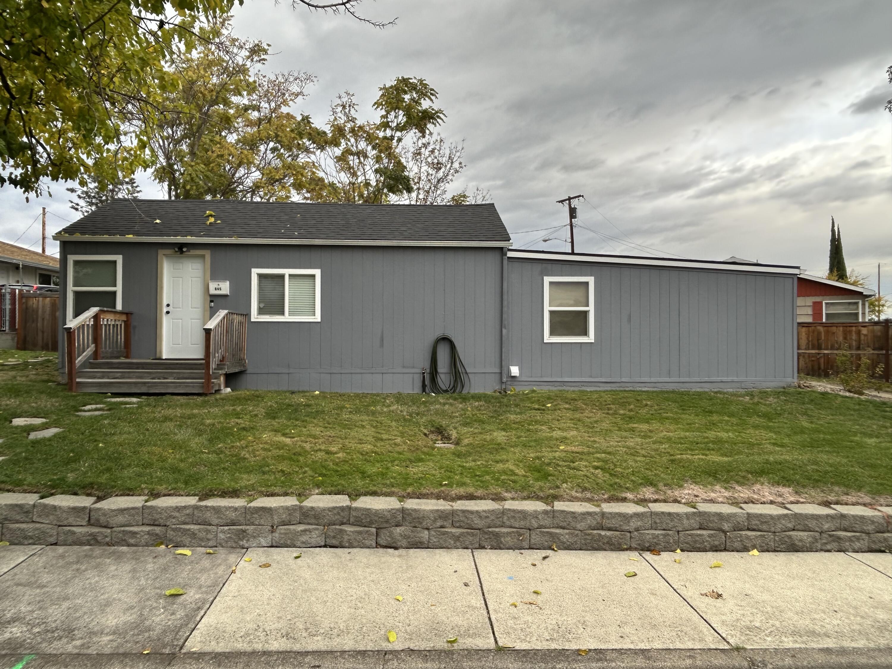 Updated 2-bedroom, 1-bath home featuring a new kitchen, new roof, fenced yard (built within the last five years), and several modern upgrades throughout. Includes an enclosed garage space with entry door but no vehicle garage door. The layout is bright and functional — perfect for a small family, first-time buyer, or investor. The yard offers plenty of space for gardening, pets, or outdoor entertaining. Conveniently located near schools, shopping, and downtown Central Point. Move-in ready with only light repairs needed to finish it off.

One of the owners is a licensed realtor in the state of Oregon (Benjamin Holt).