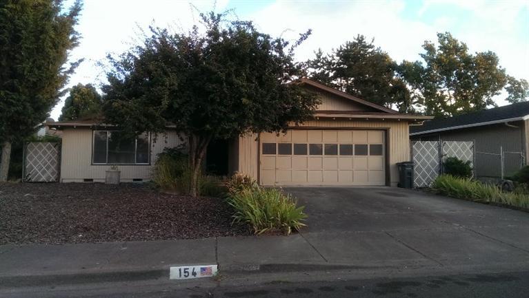Well built home in quiet neighborhood. Separate Living and Family room with fireplace and woodstove insert. Indoor laundry with nice size yard. Home is dated and needs some TLC.