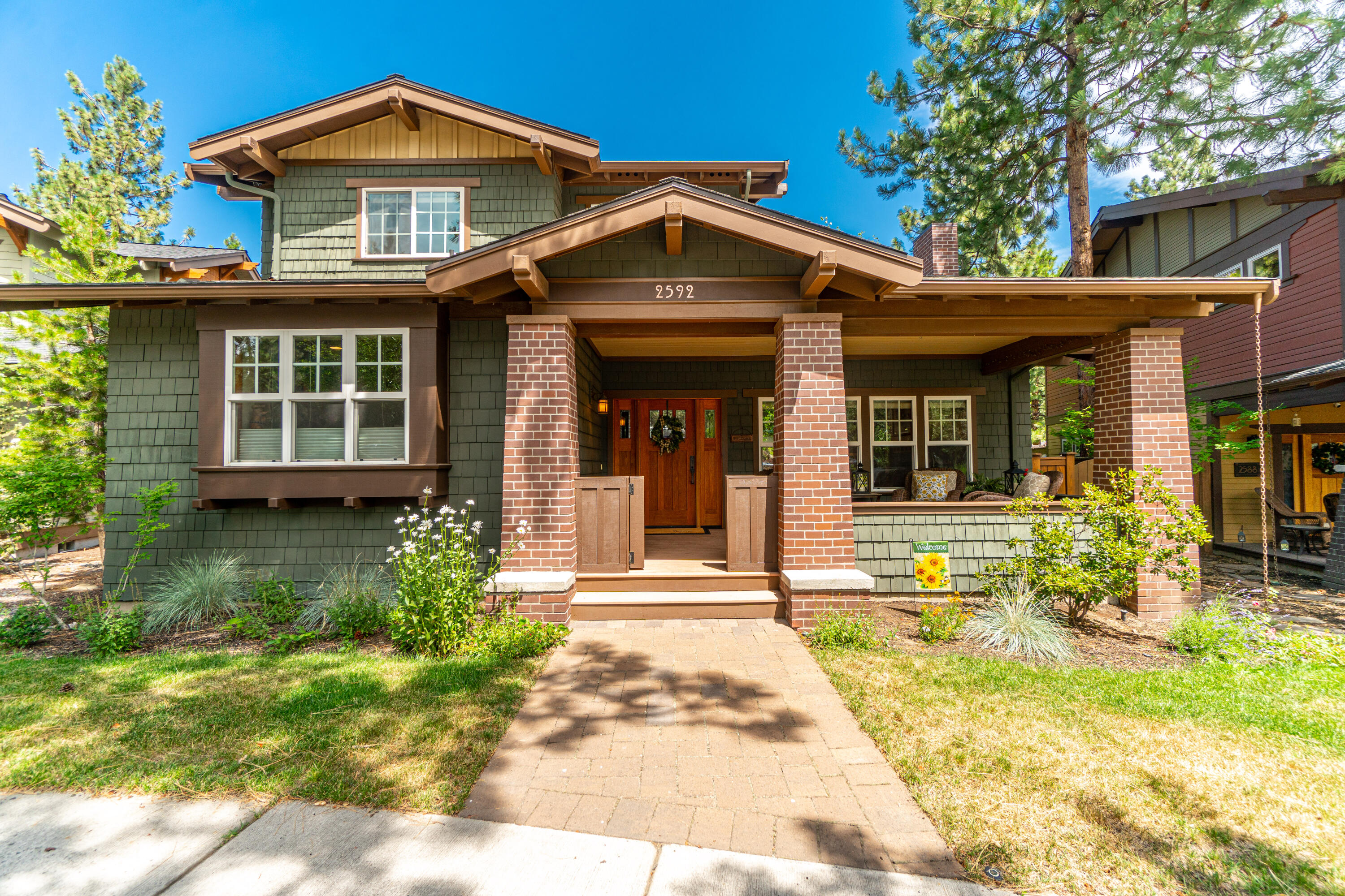 Welcome to a charming residence nestled in the desirable NWX neighborhood in Bend, OR. This meticulously designed home offers a perfect blend of style, comfort & convenience. The property boasts a ravish curb appeal w/a craftsman-inspired facade, complemented by lush trees & landscaping to be enjoyed from the porch while overlooking Compass Park. Step inside to an open-concept design bathed in natural light. High ceilings & gleaming wood floors enhance the flow between the living, dining & kitchen. The kitchen is a chef's delight, w/ commercial size fridge/freezer, custom cabinetry, & an island w/ a breakfast bar. The home offers 3 Bedrooms incl. a spacious primary suite w/ a soaking tub & walk-in shower. There's a spacious 2-Car Garage w/ add. parking in driveway. The outdoor spaces are equally impressive w/ plenty of room for relaxation, overlooking the garden & water feature! The community of NWX offers parks, trails, restaurants, providing enjoyment of the Central, OR landscape.