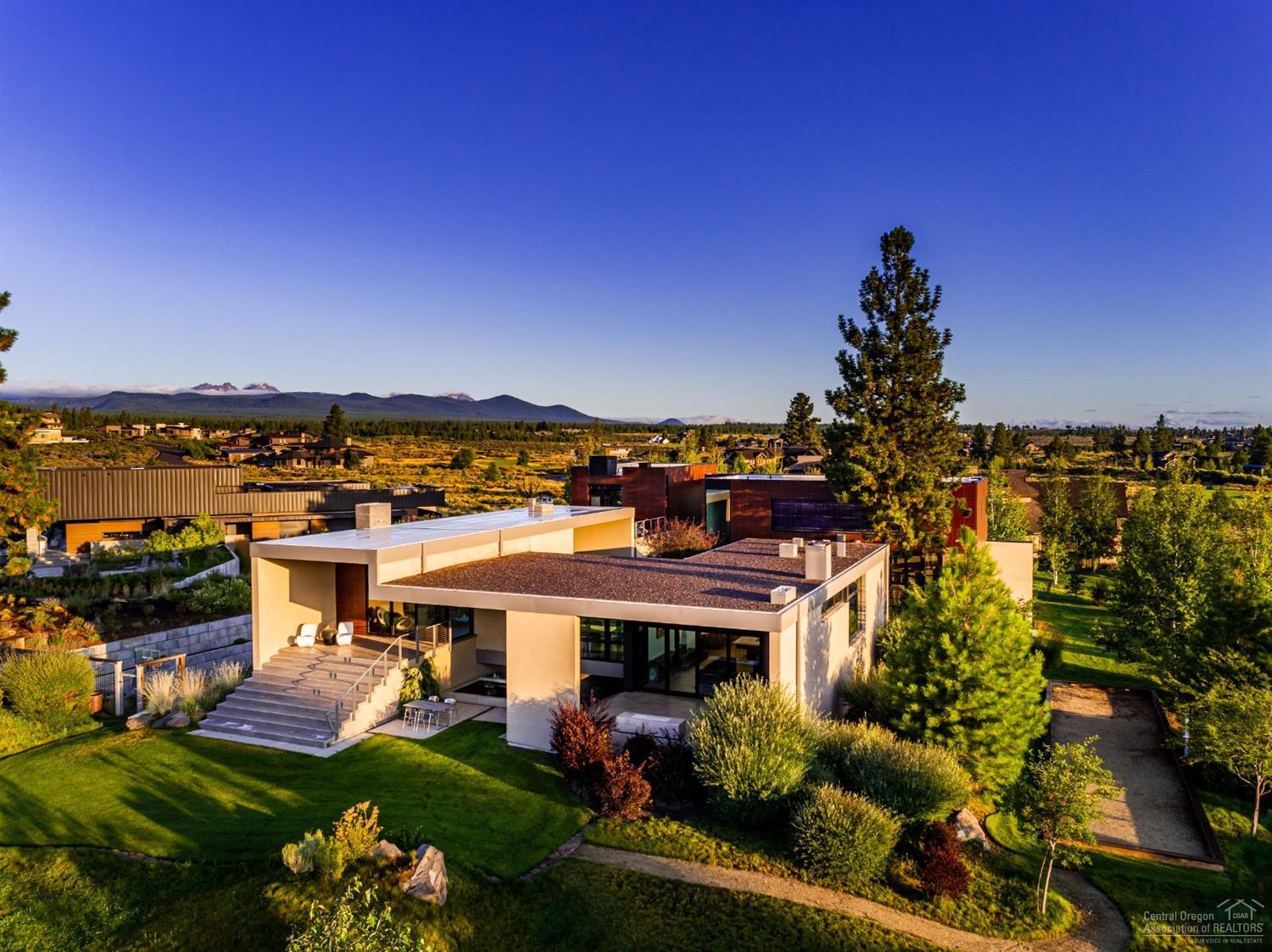 Own a remarkable home with architectural pedigree in a prestigious location with stunning views and exceptional design. This timeless contemporary home has extraordinary attention to detail throughout that exceeds the expectations of modern luxury. Designed by PIQUE Collaborative with clean lines and warm materials, using only the finest of materials and finishes, every element of this residence has been created with optimum livability. Located on a large, private 1 acre lot on Tetherow's 17th hole.