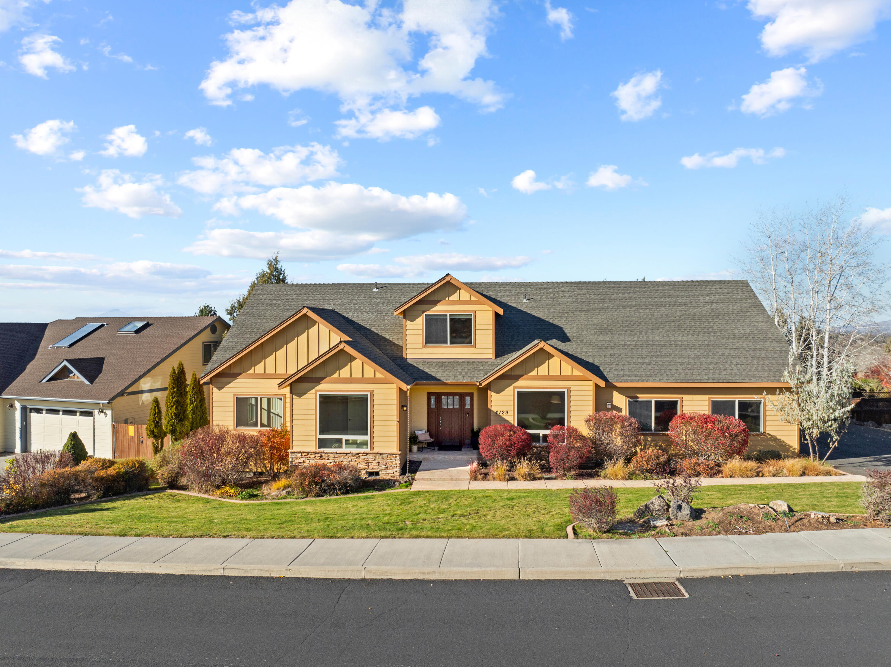 Welcome to your dream home with stunning Cascade Mountain views! This 3,036 sq ft gem blends Northwest style with modern functionality, featuring high ceilings and impressive windows in an open concept living space. The kitchen offers an oversized bar and walk-in pantry, while three bedrooms, two and a half bathrooms and primary bedroom complete the main level. The primary suite, thoughtfully separated from the other bedrooms, provides a retreat with soaking tub, double sinks and a walk-in shower. The bonus loft is versatile for when you need a home office, playroom or workout space. New carpeting adds an inviting vibe, while the three-car garage caters to your parking and storage needs. On a .27-acre lot, enjoy indoor-outdoor living and serene sunsets from your private deck. Just 15 minutes from Bend and close to the airport, this remarkable Redmond home, in a desirable neighborhood, is a must-see!
