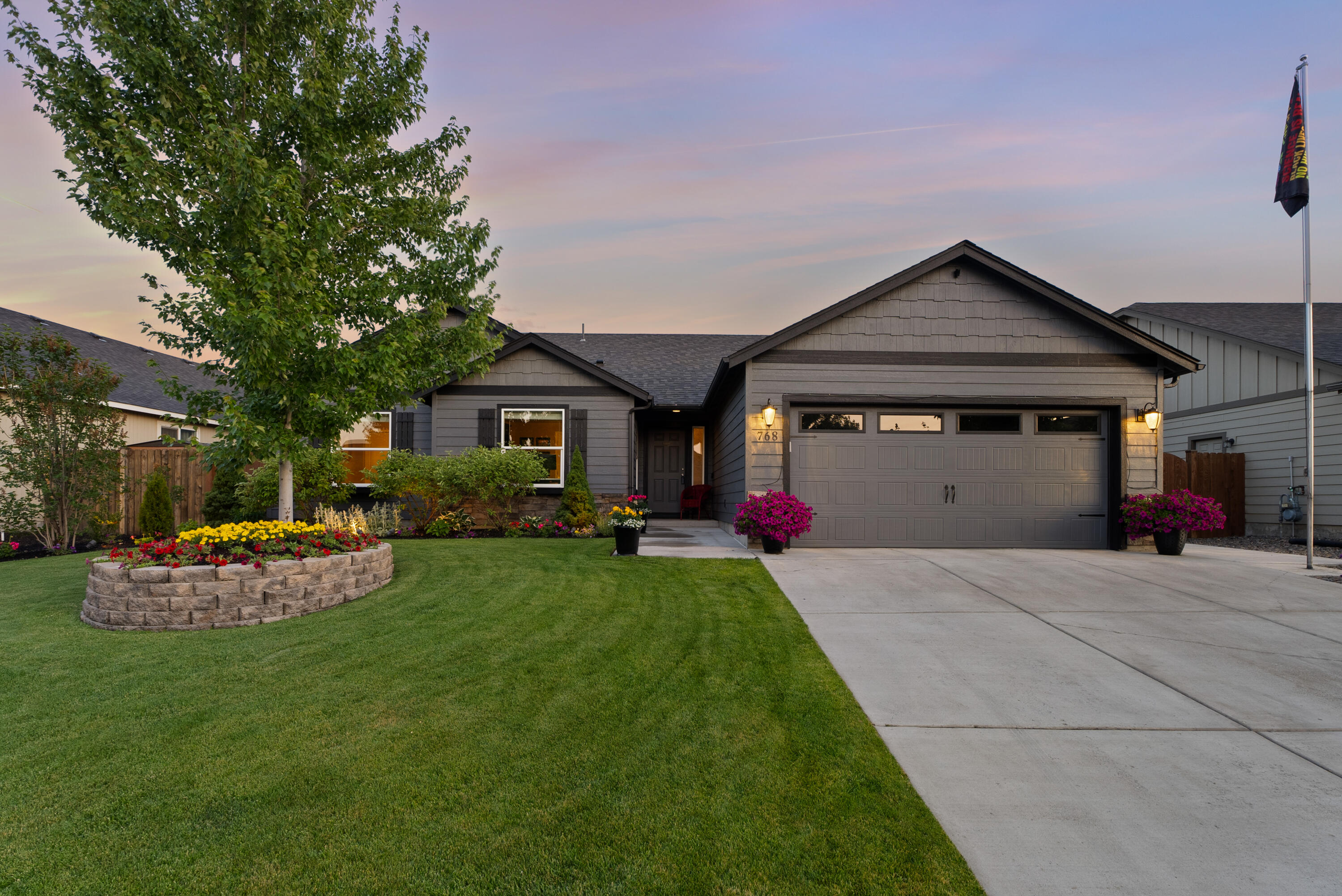 Welcome to this well maintained single story home located on a quiet cul-de-sac. This home features a functional floorplan, 3 spacious bedrooms, plus a dedicated office, 2 full bathroom and a convenient laundry room complete with a sink. Enjoy open concept living with vaulted ceilings in the living room, a cozy gas fireplace, and the well appointed kitchen keeps everyone connected. The kitchen offers ample counter space with the oversized island, granite countertops, stainless steel appliance, and a walk-in pantry. Step outside to the lovely backyard which is elevated above neighboring homes for enhanced privacy—perfect for relaxing or entertaining. The outdoor space includes a generous covered patio, a pergola, a hot tub, and beautifully maintained landscaping.  Additional highlights include newer carpet in the bedrooms, air conditioning, an outdoor storage shed, and more. This home is truly move-in ready—don't miss your opportunity to make it yours!