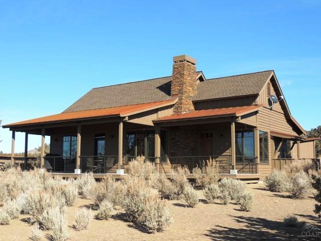 Relax at Brasada Ranch in the Rustic Elegance of this Exquisite Luxury Ranch Cabin, Professionally Furnished with Rich Finishes, Vaulted Ceilings, Scraped Maple Wood Floors, Granite Counter Tops and Gas Fireplace. Beautiful Mountain Views off Back Deck and within Walking Distance to the Athletic Center. Enjoy all the benefits of membership and amenities, State of the Art Athletic Center, World Class Equestrian Center, Peter Jacobsen/Jim Hardy 18 hole Golf Course, Spa Brasada, Restaurants, Hiking and Biking!