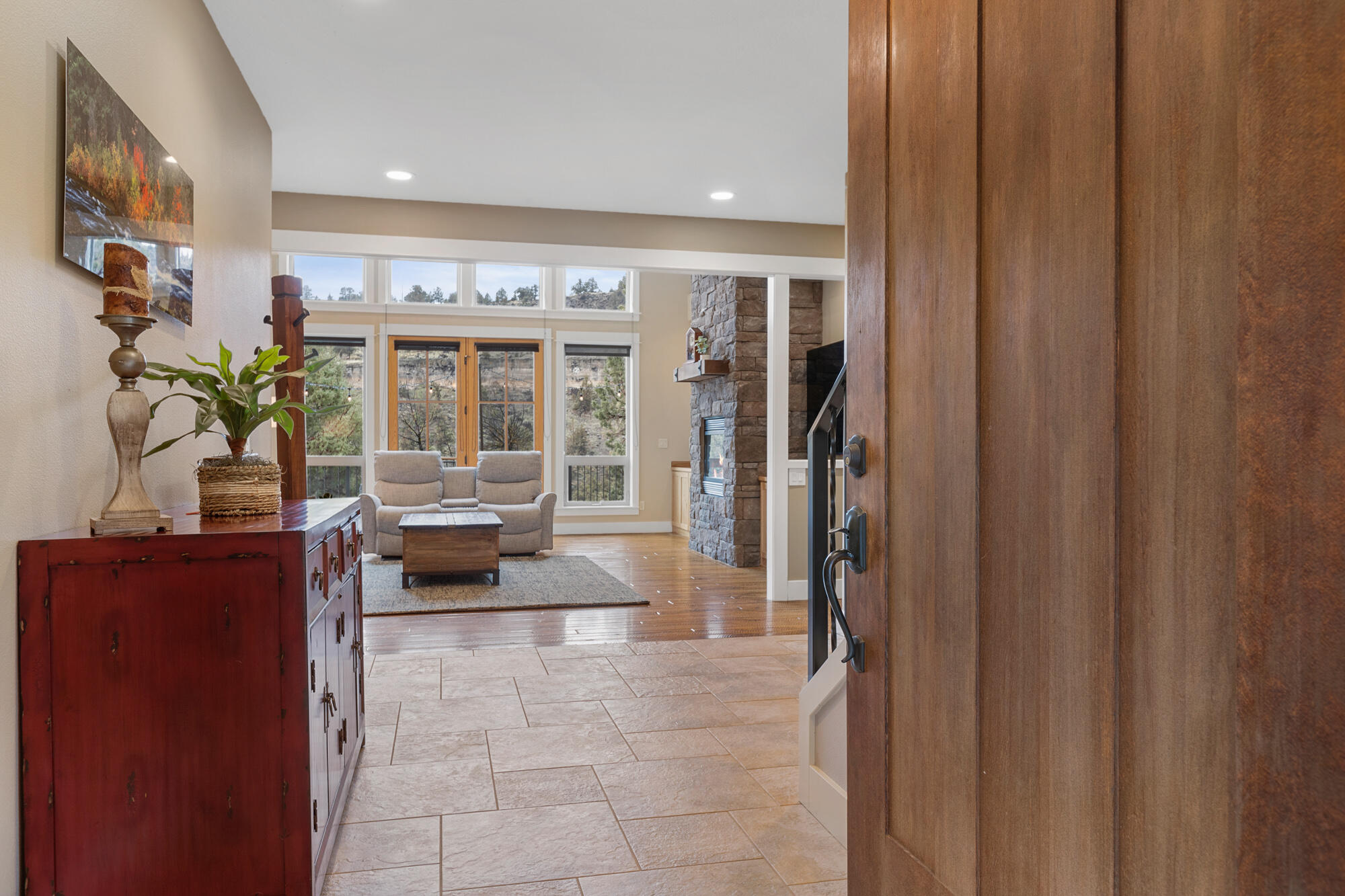 Custom built 3329 sq ft 4 bedroom 3 bathroom plus main level large office. Luxury custom built home with designer finishes on 2.44 acres located in exclusive gated Odin Falls Ranch neighborhood with access to the Deschutes River. Fish, float, swim. enjoy!  The home lives pride of ownership.  Custom Hickory cabinets and floors, vaulted ceilings open floor plan with magnificent stone gas fireplace. Gourmet kitchen. Main level master bedroom suite and luxury master bath with in floor heat. 2nd main level bedroom plus two more bedrooms upstairs. media room, exercise room. Triple car garage oversized with workshop