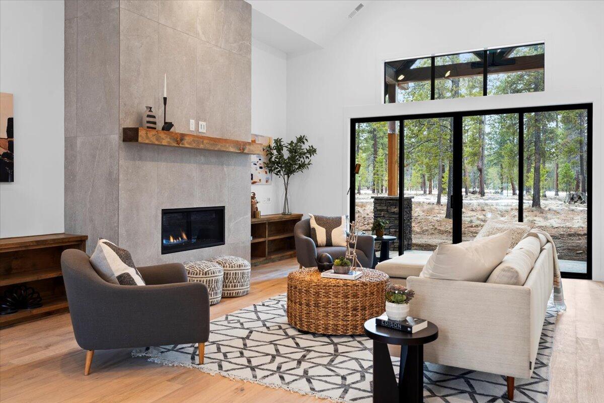 Experience mountain-modern living in this brand-new home in one of Central Oregon's premier resort communities! Enjoy single level living designed with function and comfort in mind, enhanced with sophisticated style and timeless finishes. The great room features a floor to ceiling tile surround linear gas fireplace and stained knotty alder built-ins for a modern touch. Enjoy hardwood flooring in the kitchen and great room with natural light beaming throughout the home. All 4 bedrooms are en-suites with private bathrooms. The primary suite features a free-standing tub, tiled shower and spacious walk in closet. Plentiful interior storage throughout home. Vacation rentals allowable in the community. Est. completion mid-February. Owners will enjoy benefits and amenities of Caldera Springs; 9-hole golf, miles of walking & biking trails, lakes and the new Forest House. New dining experience coming to community summer 2024.
