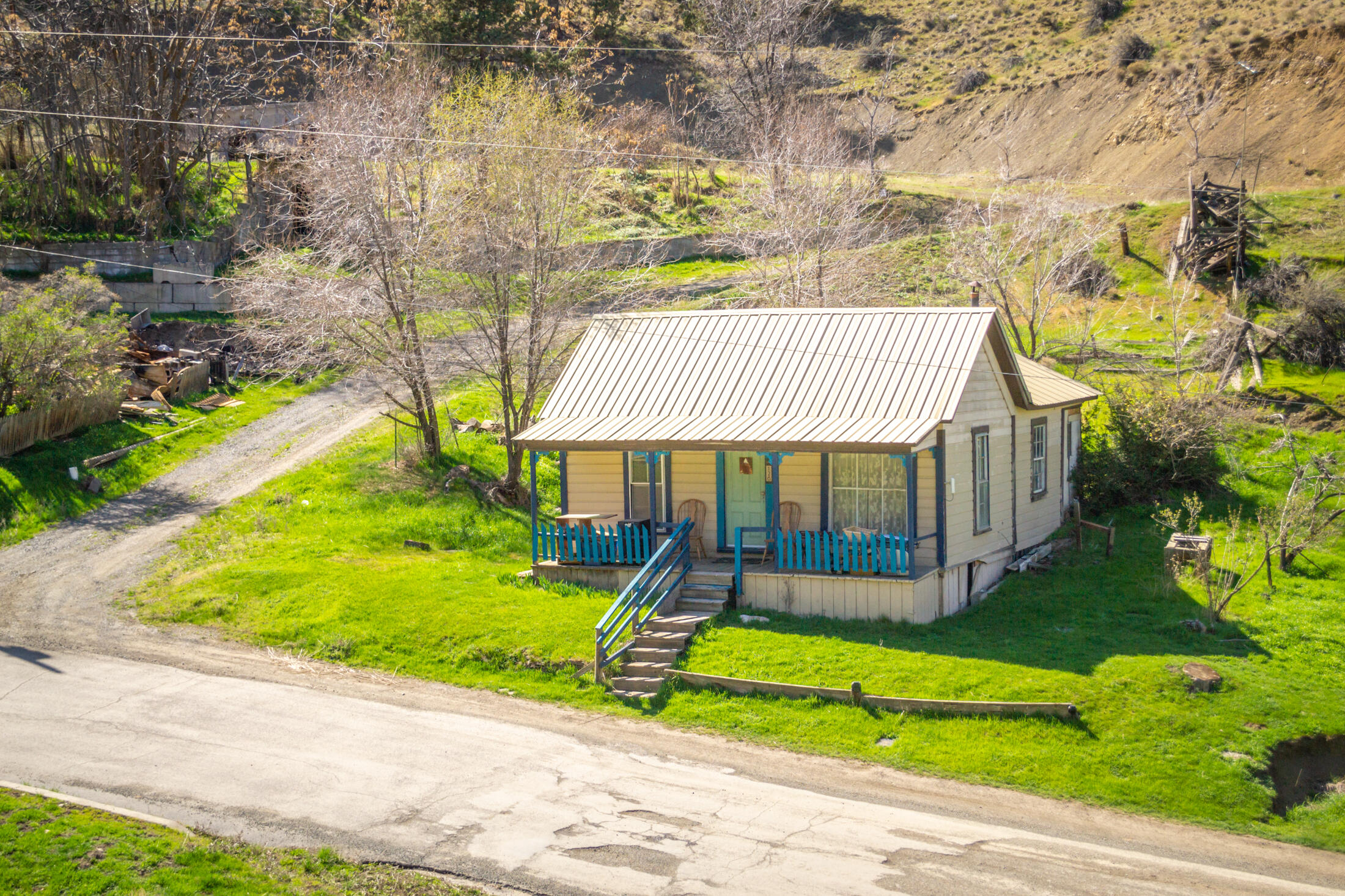 Step back in time! This 714 sq ft home, built in 1910 back when living simple was the only way, is located on .12 acre in Mitchell, Oregon. The home features 2 bed 1 bath, living area, kitchen and a sleepy front porch for relaxing. This would be a great opportunity to create family memories or maybe have a vacation rental (check with County for approved uses) The community of Mitchell has a grocery store with just about everything you could need, Tiger Town brewery has great eats and live music, Bridge Creek Cafe features good ole comfort food and Route 26 Espresso has the best home made maple bars and espresso! The famous Painted Hills, Lucky Strike Mine and John Day Fossil Beds offer wonderful exploring opportunities. Labor Day weekend, Mitchell celebrates the colorful Painted Hills Festival--an old-fashioned, fun event for the entire family. Fish the John Day River or Rowe Creek Reservoir where peace and solitude are abundant as well as the fishing!