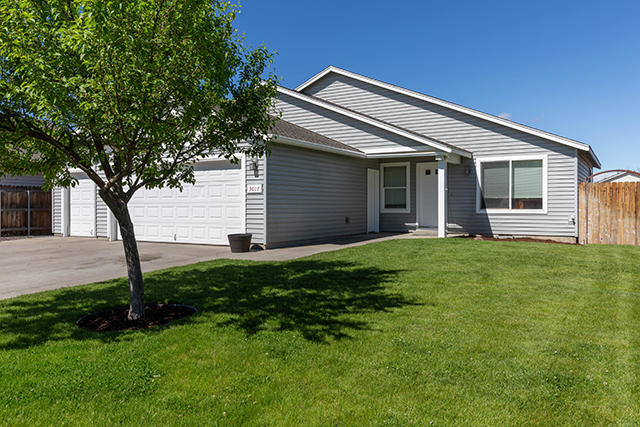 This 3 Bedroom / 2 Bath single-level house sits on a non-thru street in NW Redmond and features a large back yard, 3 car garage, vaulted ceilings, laundry room, and even has A/C.  It is within walking distance to Tom McCall Elementary School, Elton Gregory Middle School, and Quince Park.  Kitchen has a gas stove and a window over the sink looking out at the fully fenced back yard. This home will be great with a little TLC and your personal touch added to it.  It would also be a great investment property.