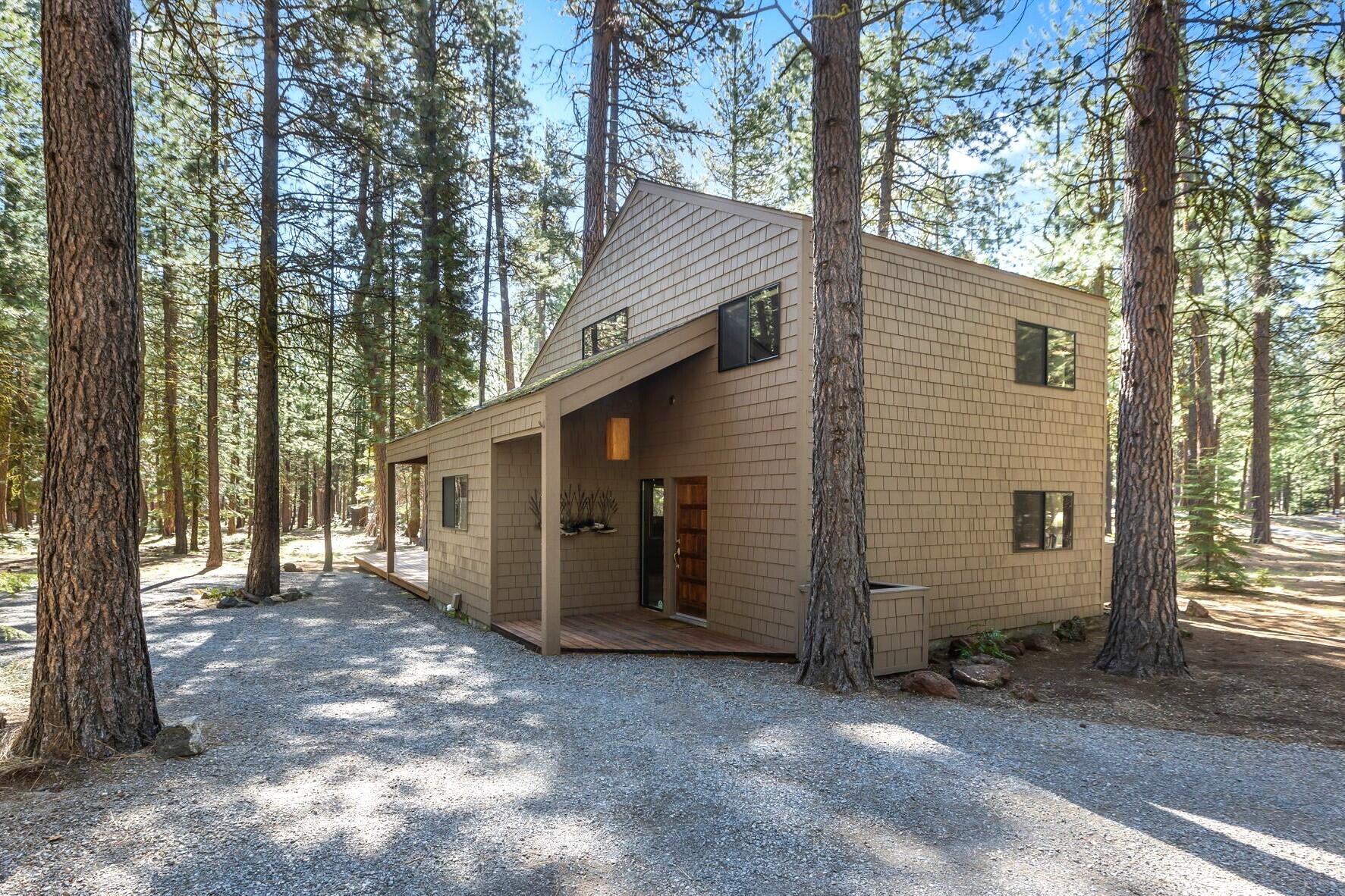 Your own private oasis in the forest at Black Butte Ranch where you can enjoy all that the Central Oregon lifestyle has to offer. This conveniently located home on a half acre lot is a short distance to the Glaze Meadow Recreation Center, Downtown Sisters, & backs to your own forested greenspace. The main living area ftrs vaulted ceilings adorned w/natural wood paneling & beams, an abundance of natural light from floor to ceiling windows, & a cozy stone surround wood burning fireplace. Kitchen comes fully equipped w/all appliances, boasts brkfst bar seating, plenty of cabinetry for storage + prep counterspace. Primary bedroom is conveniently located on main level w/adjacent bath. Two addtnl bedrooms share a full bath upstairs off the bonus loft area that serves as a second family room. Massive wrap around deck for quiet mornings/evenings watching the wildlife right out your backdoor. Home comes fully furnished & has access to all of the amenities Black Butte Ranch has to offer.